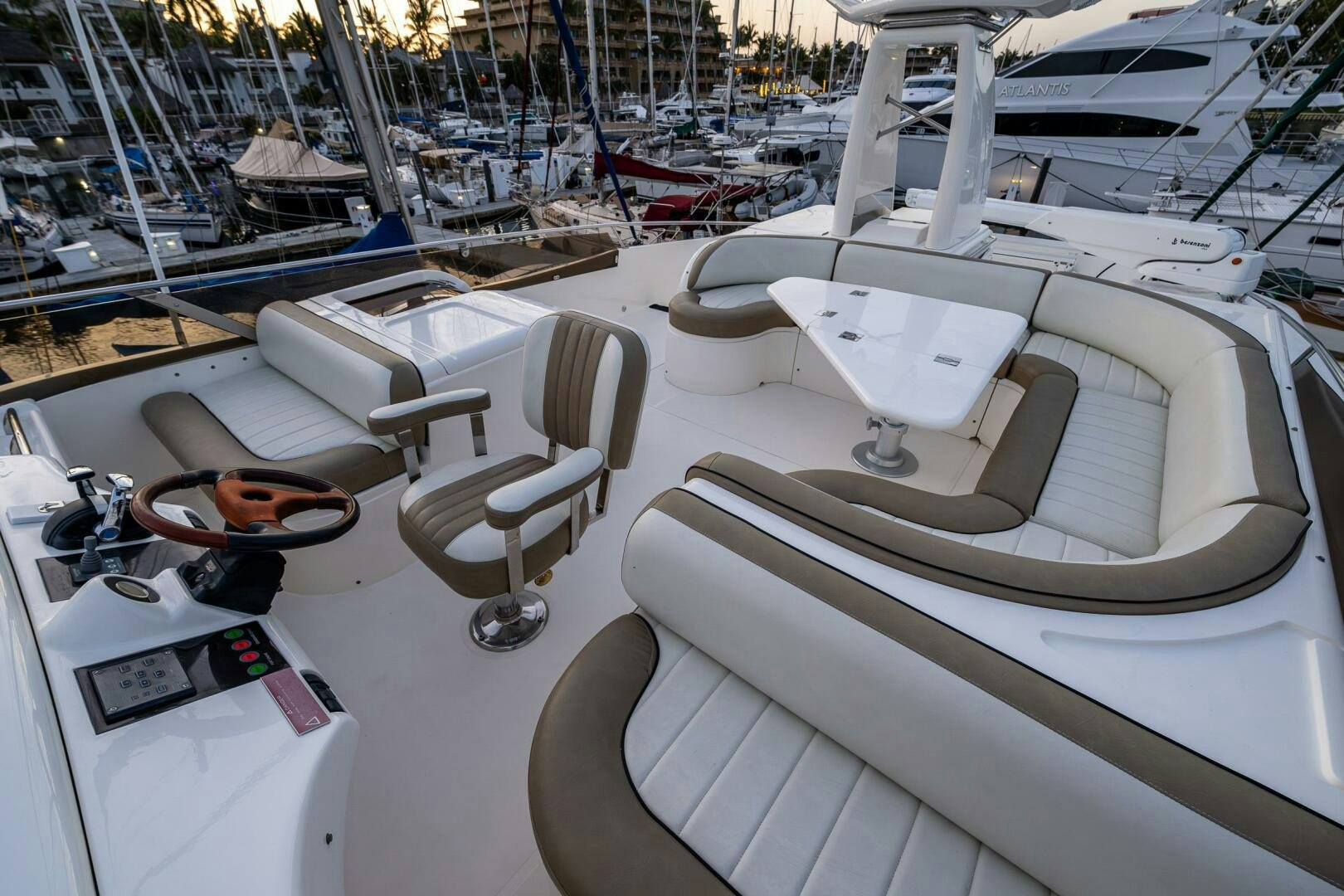 a boat with a seat and steering wheel aboard PEARL Yacht for Sale