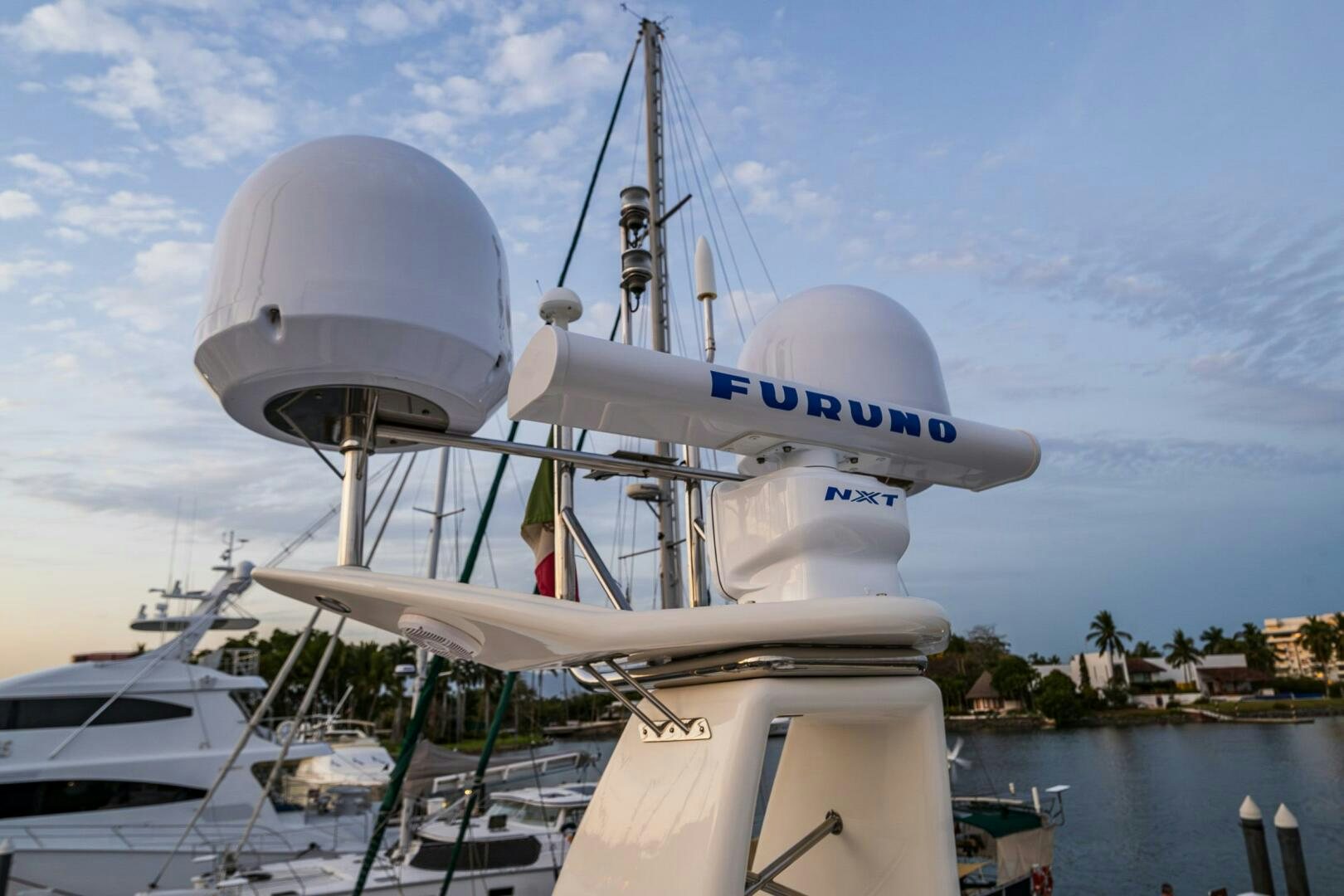 a white boat with a satellite dish on it aboard PEARL Yacht for Sale
