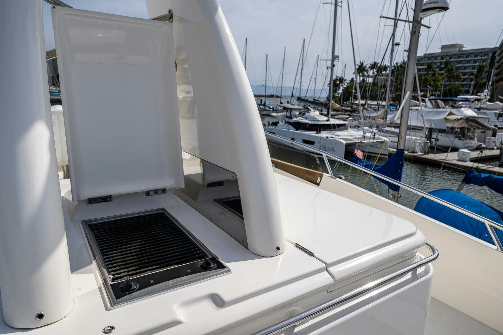 a white boat with a black screen aboard PEARL Yacht for Sale