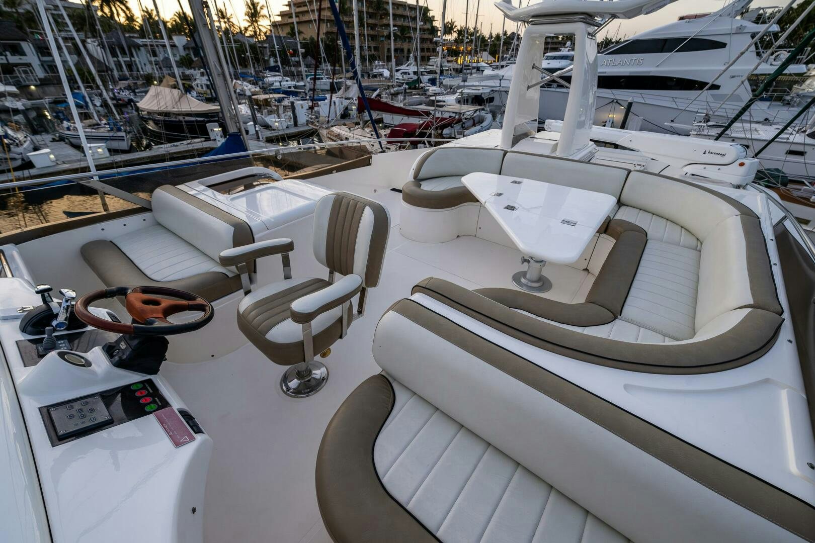 a boat with a seat and steering wheel aboard PEARL Yacht for Sale
