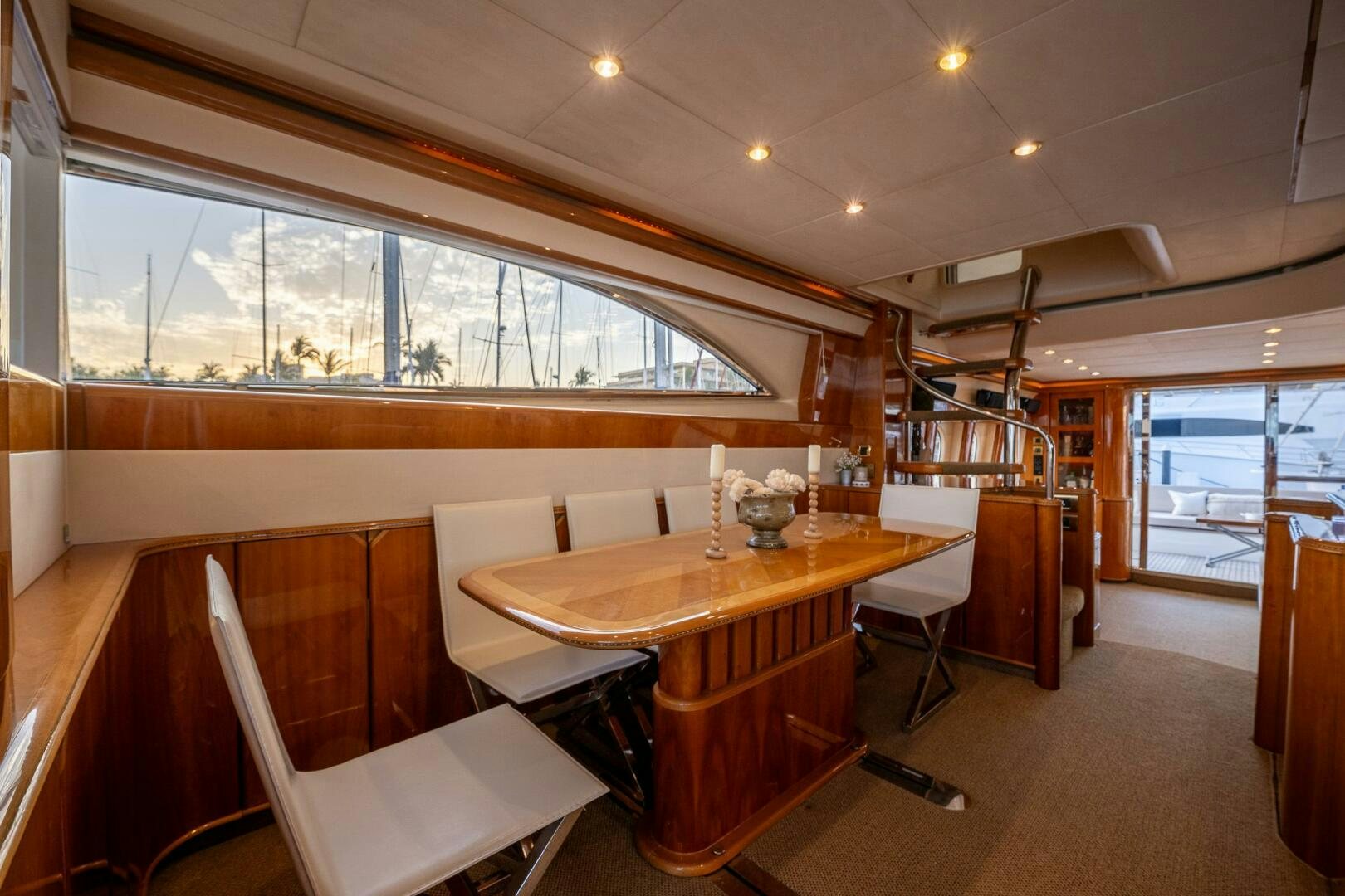 a room with a table and chairs aboard PEARL Yacht for Sale