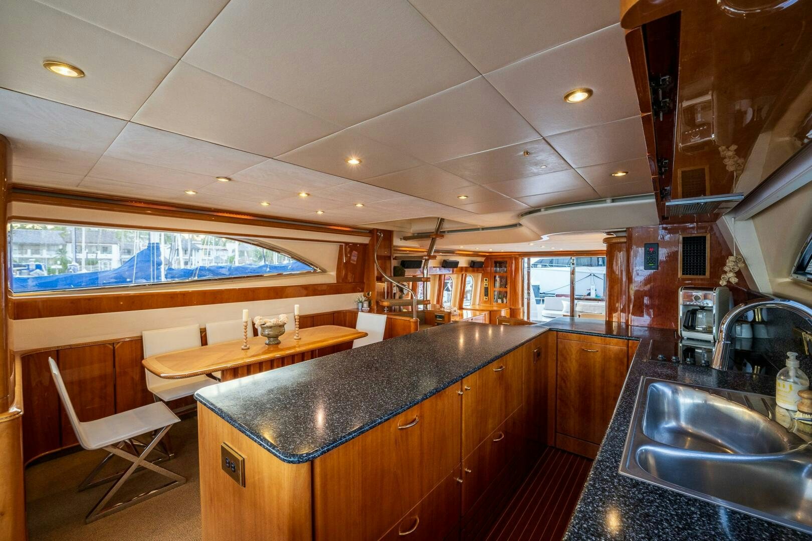 a kitchen with a large island aboard PEARL Yacht for Sale
