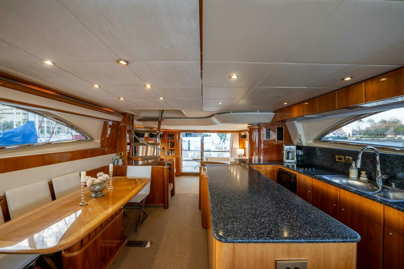 a kitchen with a large island aboard PEARL Yacht for Sale