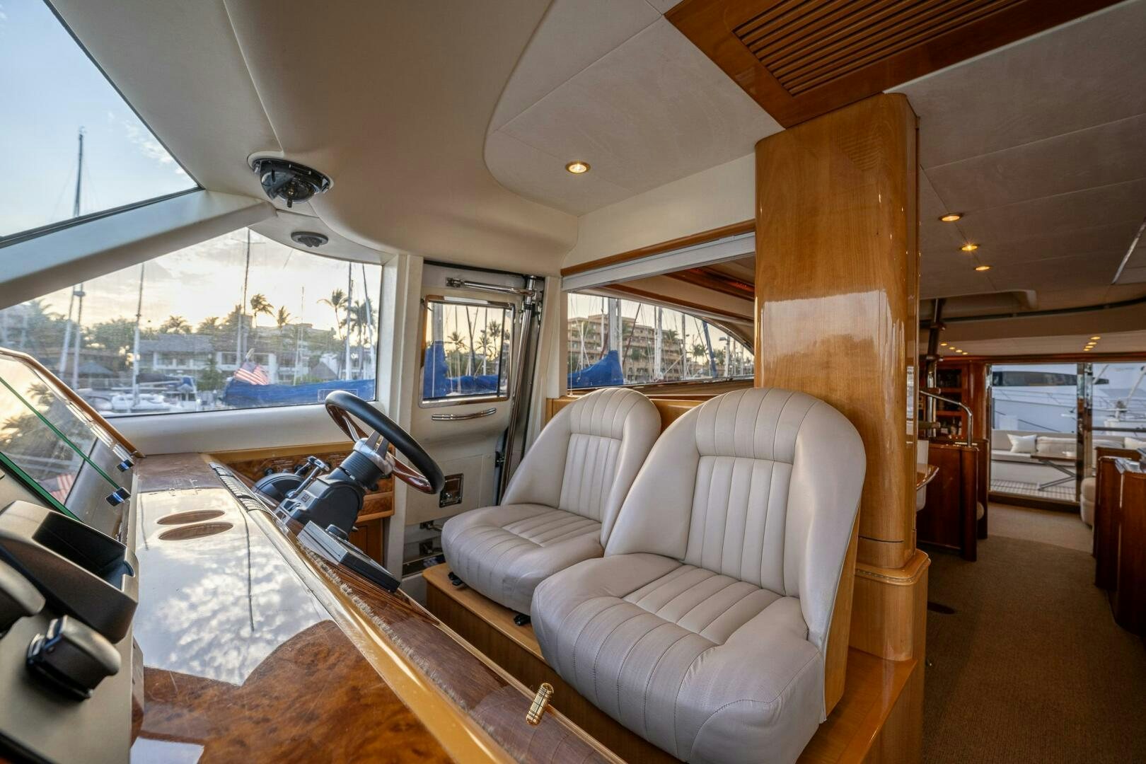 a boat with a deck and chairs aboard PEARL Yacht for Sale