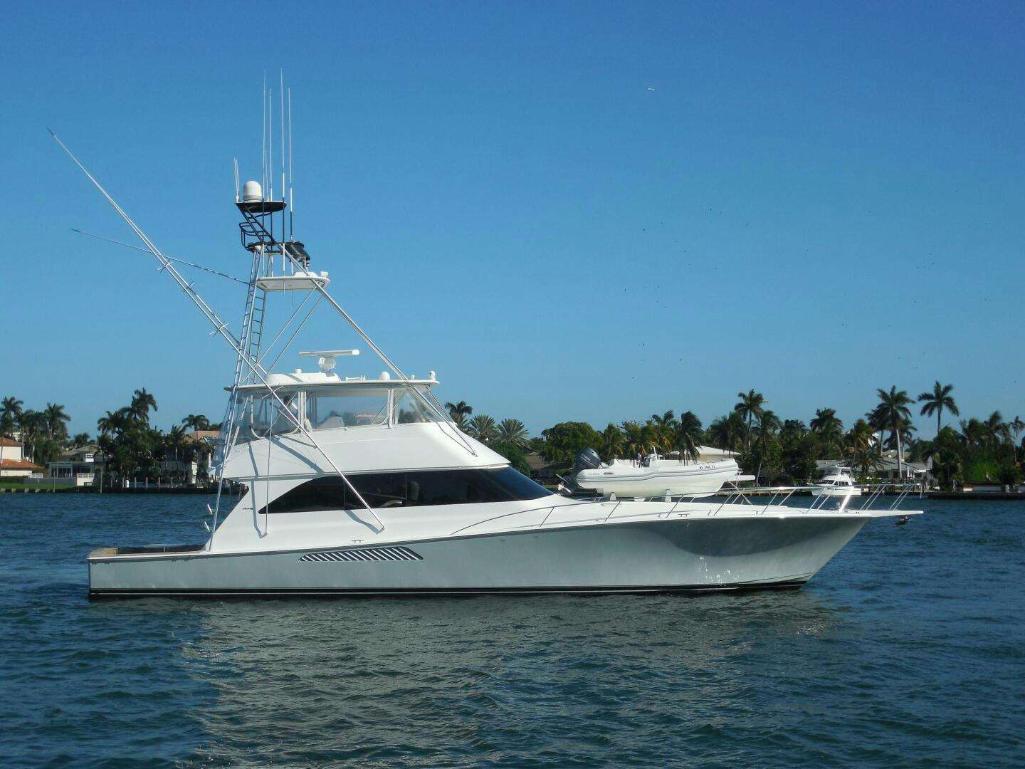 a white boat in the water aboard TRICIA III Yacht for Sale