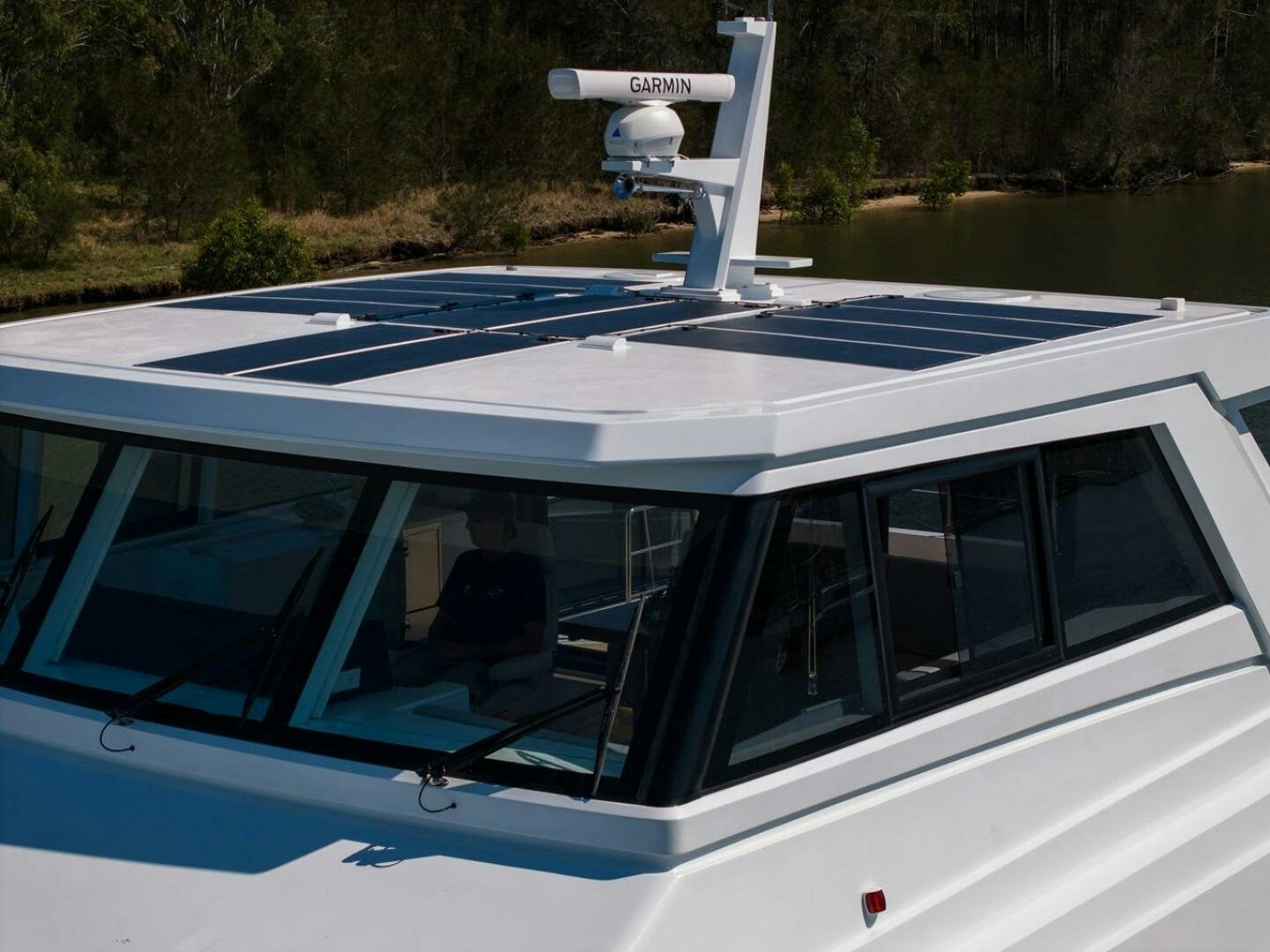 a white car with a solar panel on top aboard NONE Yacht for Sale