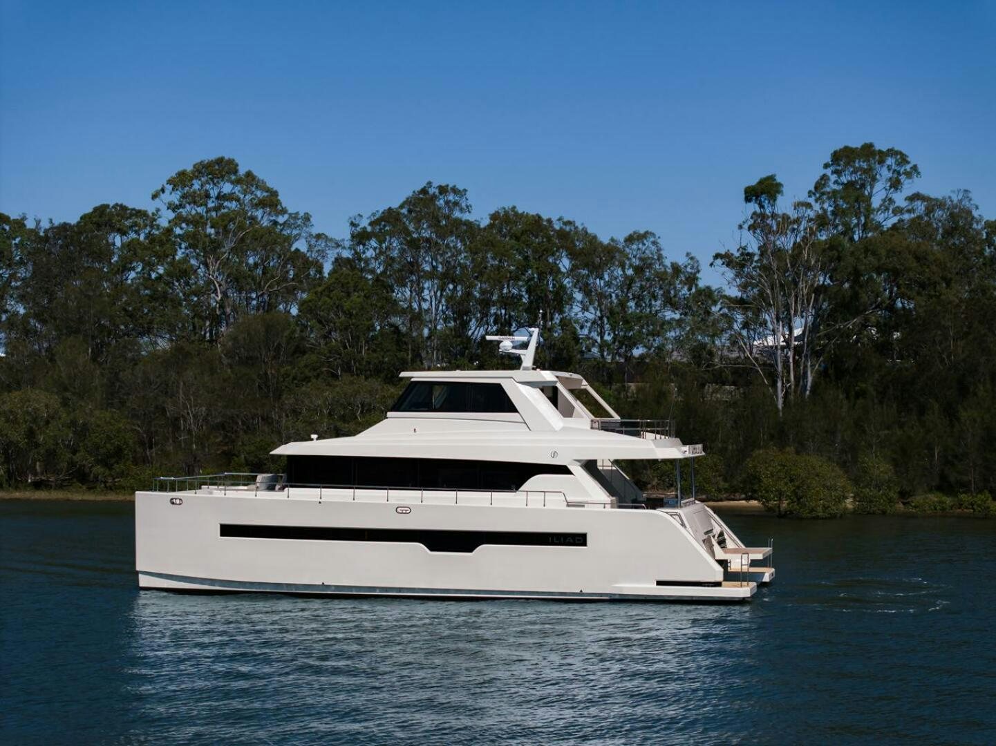 a white yacht on the water aboard NONE Yacht for Sale