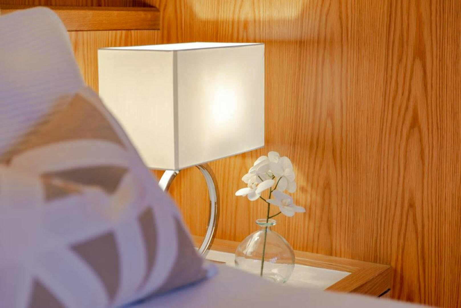 a lamp on a table aboard NONE Yacht for Sale