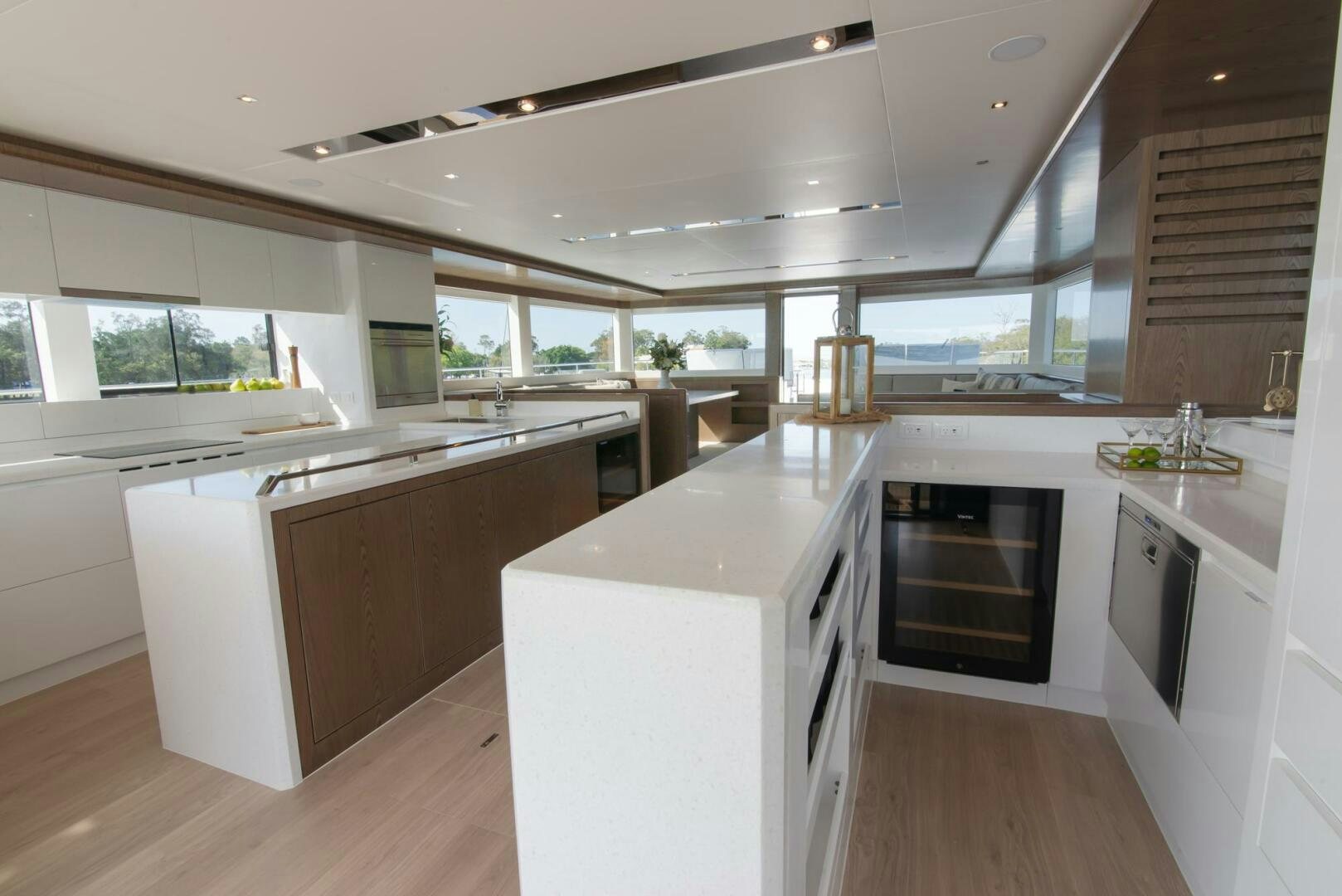 a kitchen with white cabinets aboard NONE Yacht for Sale