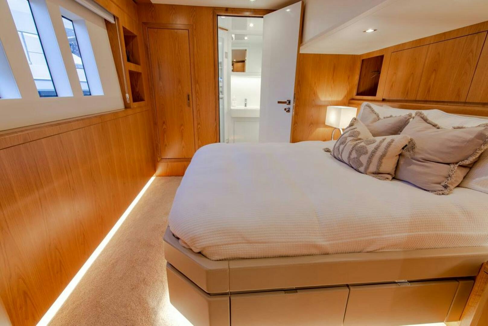 a bed in a room aboard NONE Yacht for Sale