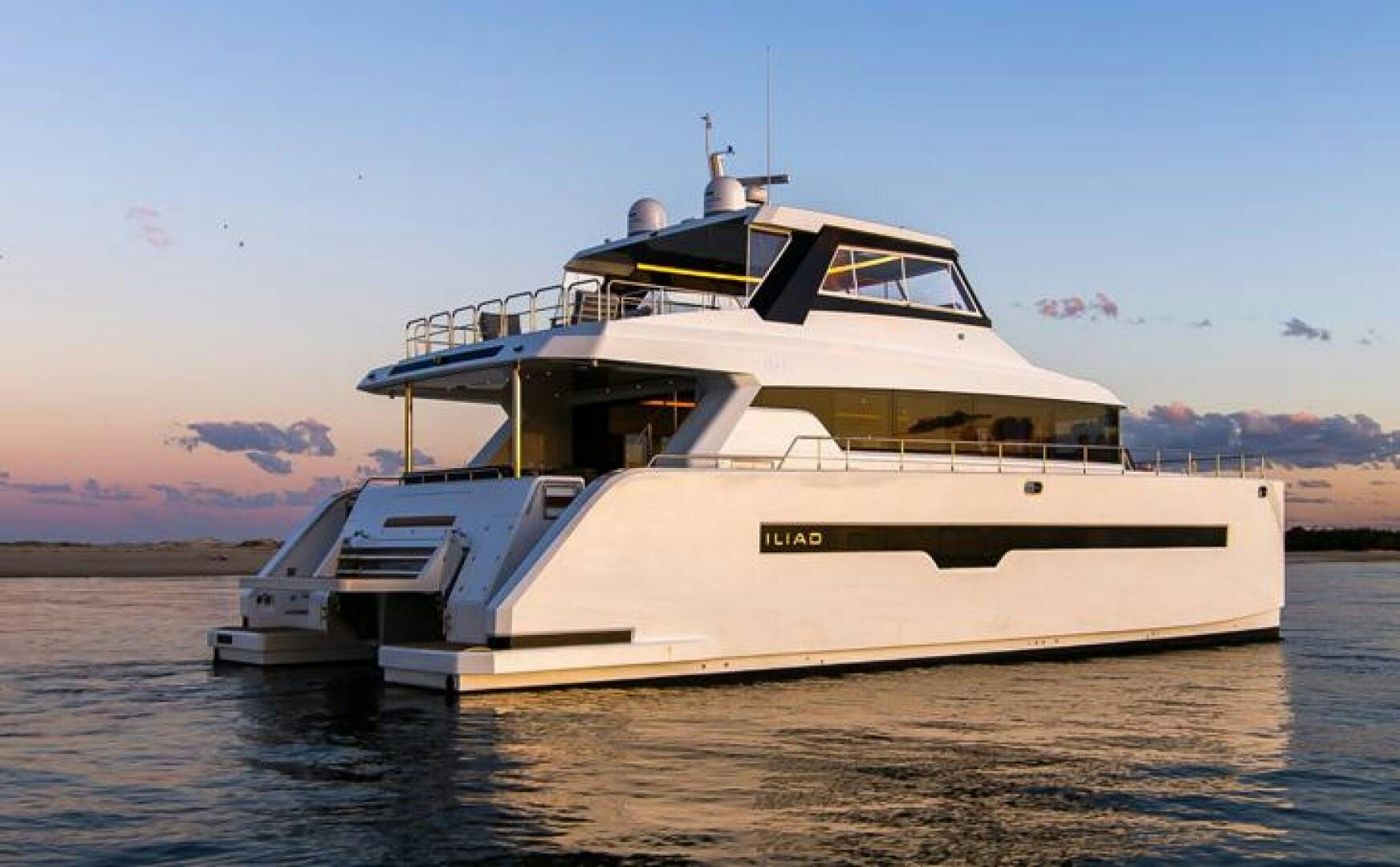 a large white boat in the water aboard NONE Yacht for Sale