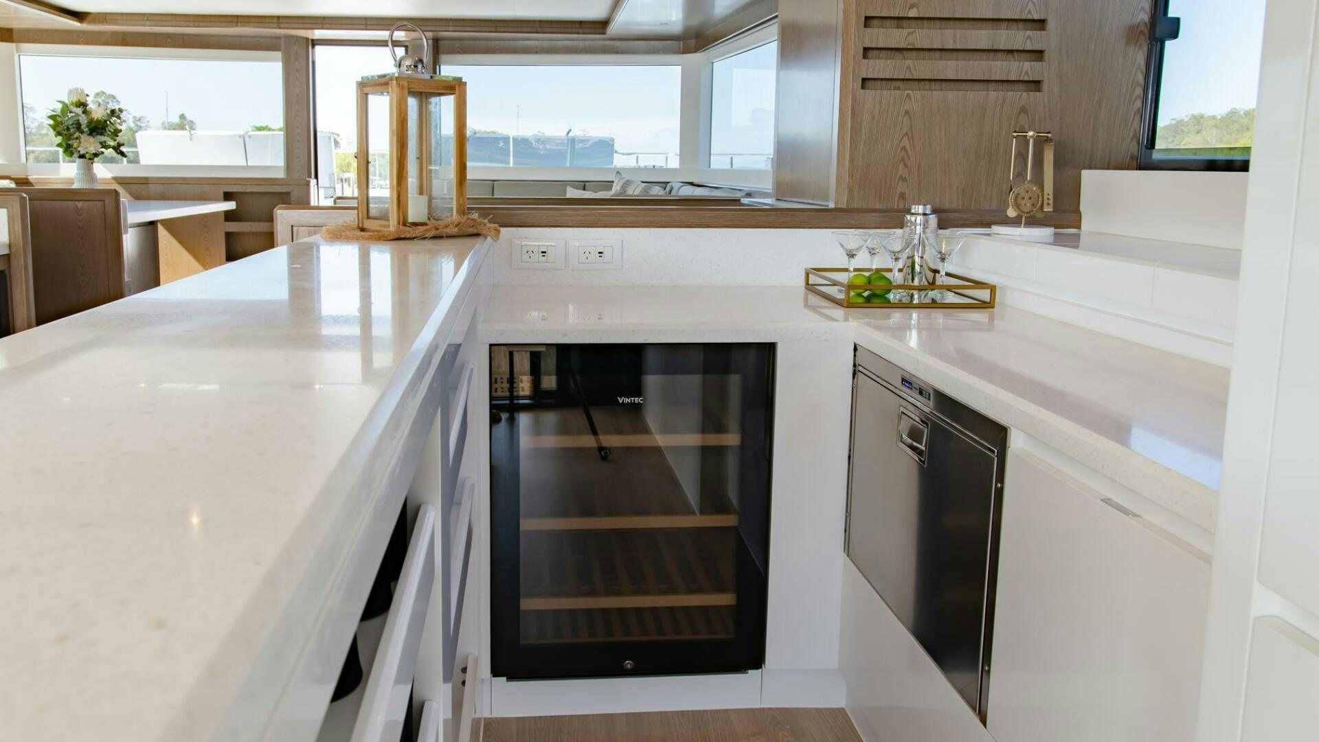 a kitchen with white cabinets aboard NONE Yacht for Sale