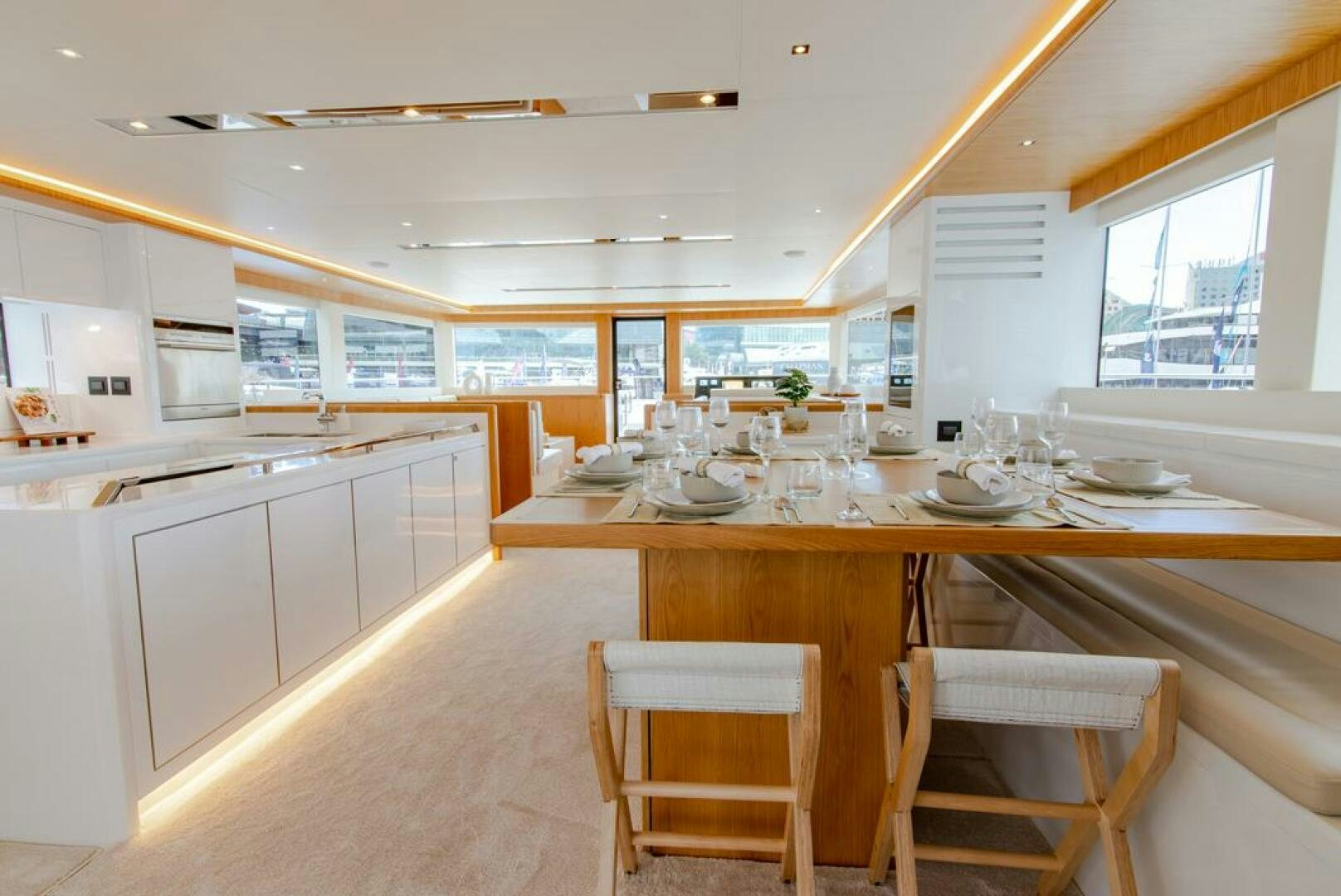 a kitchen with white cabinets aboard NONE Yacht for Sale