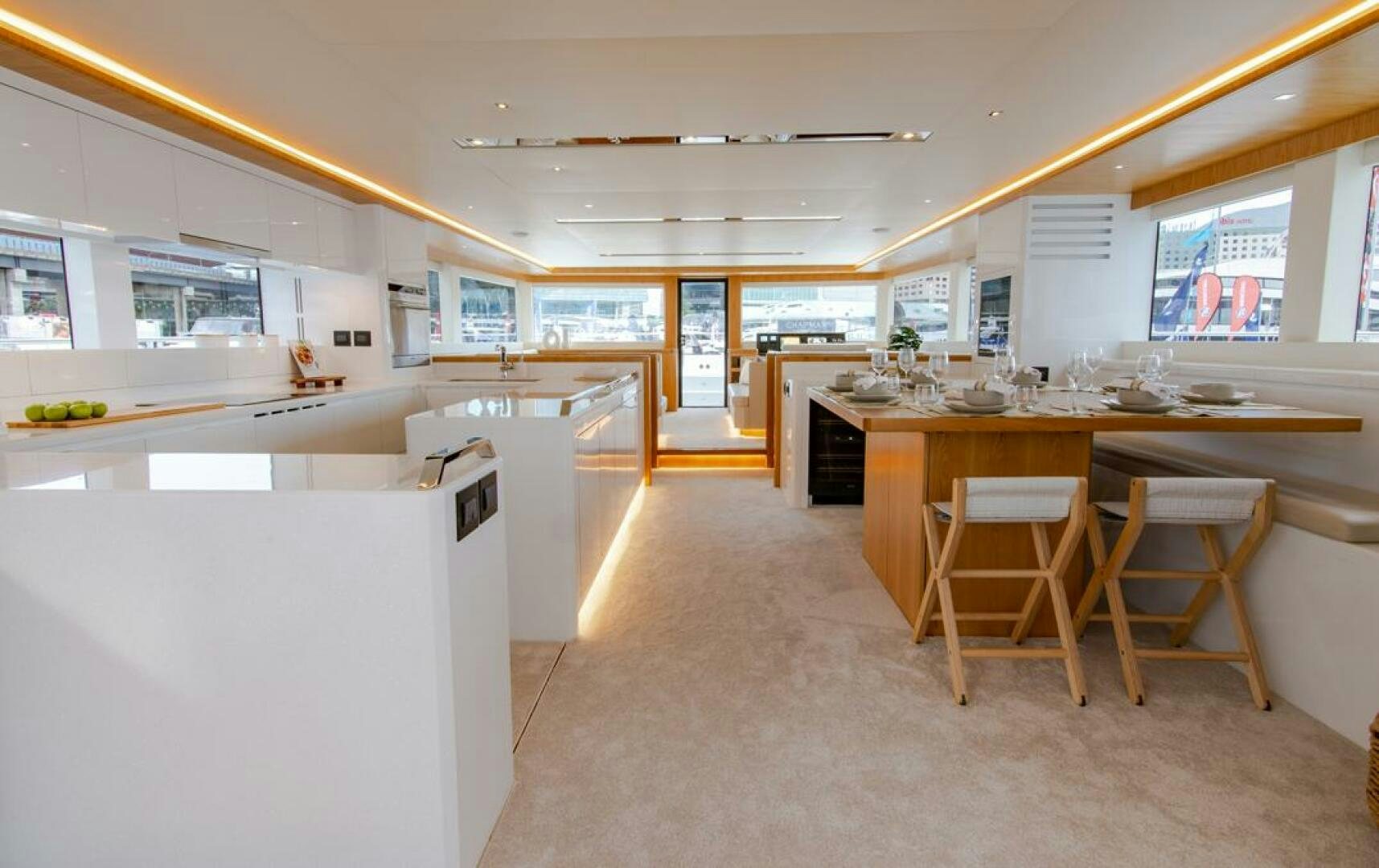 a room with tables and chairs aboard NONE Yacht for Sale