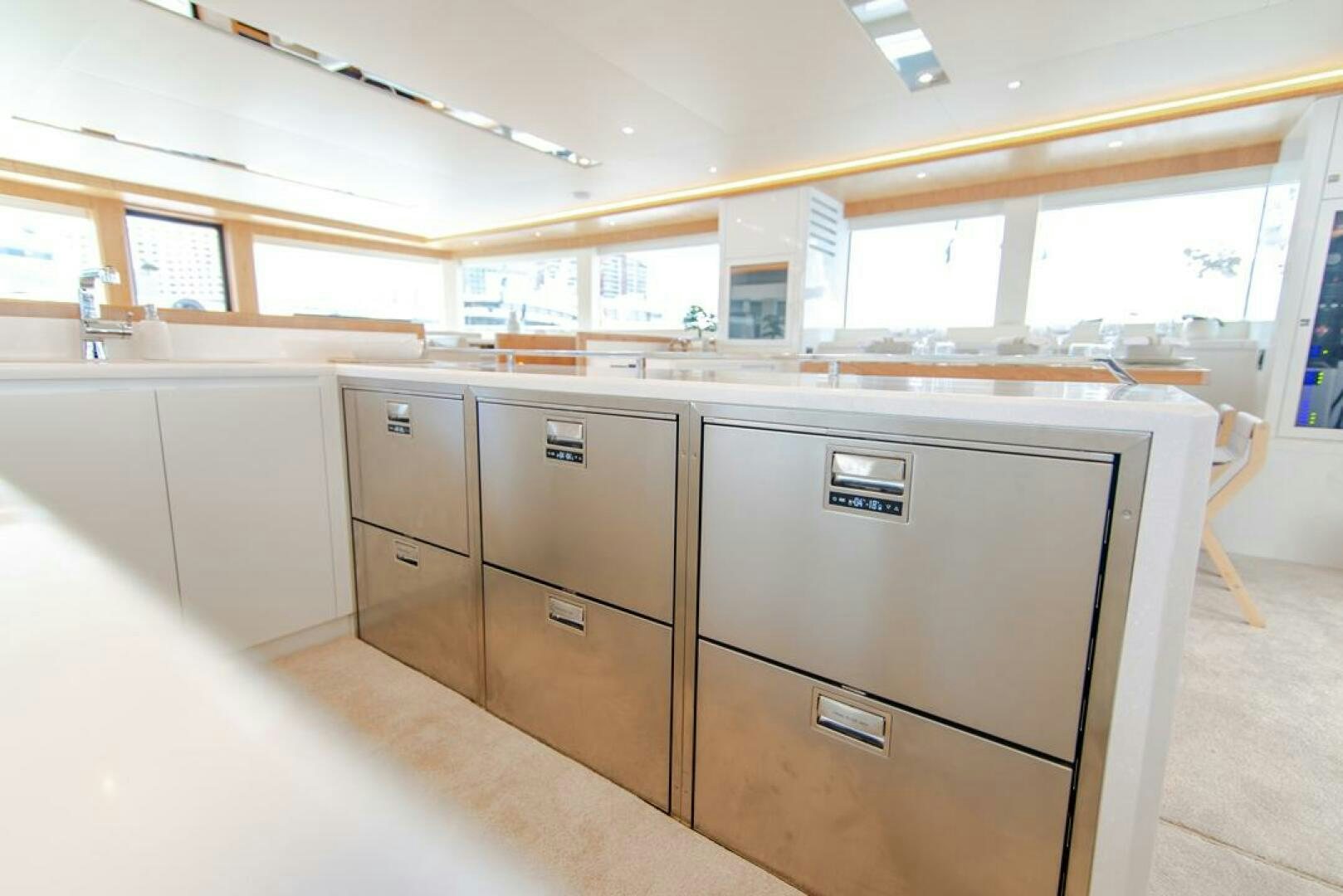 a kitchen with a large island aboard NONE Yacht for Sale