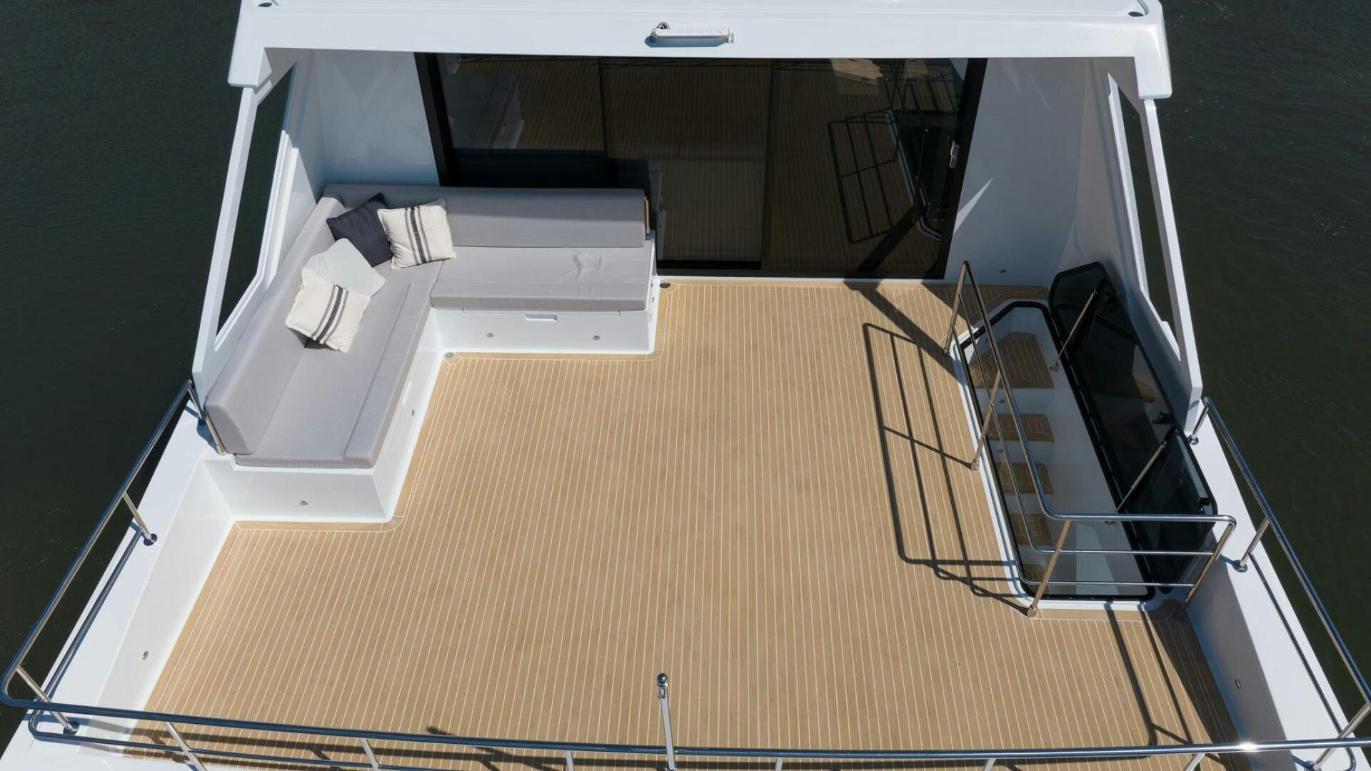 a room with a bed and a desk aboard NONE Yacht for Sale