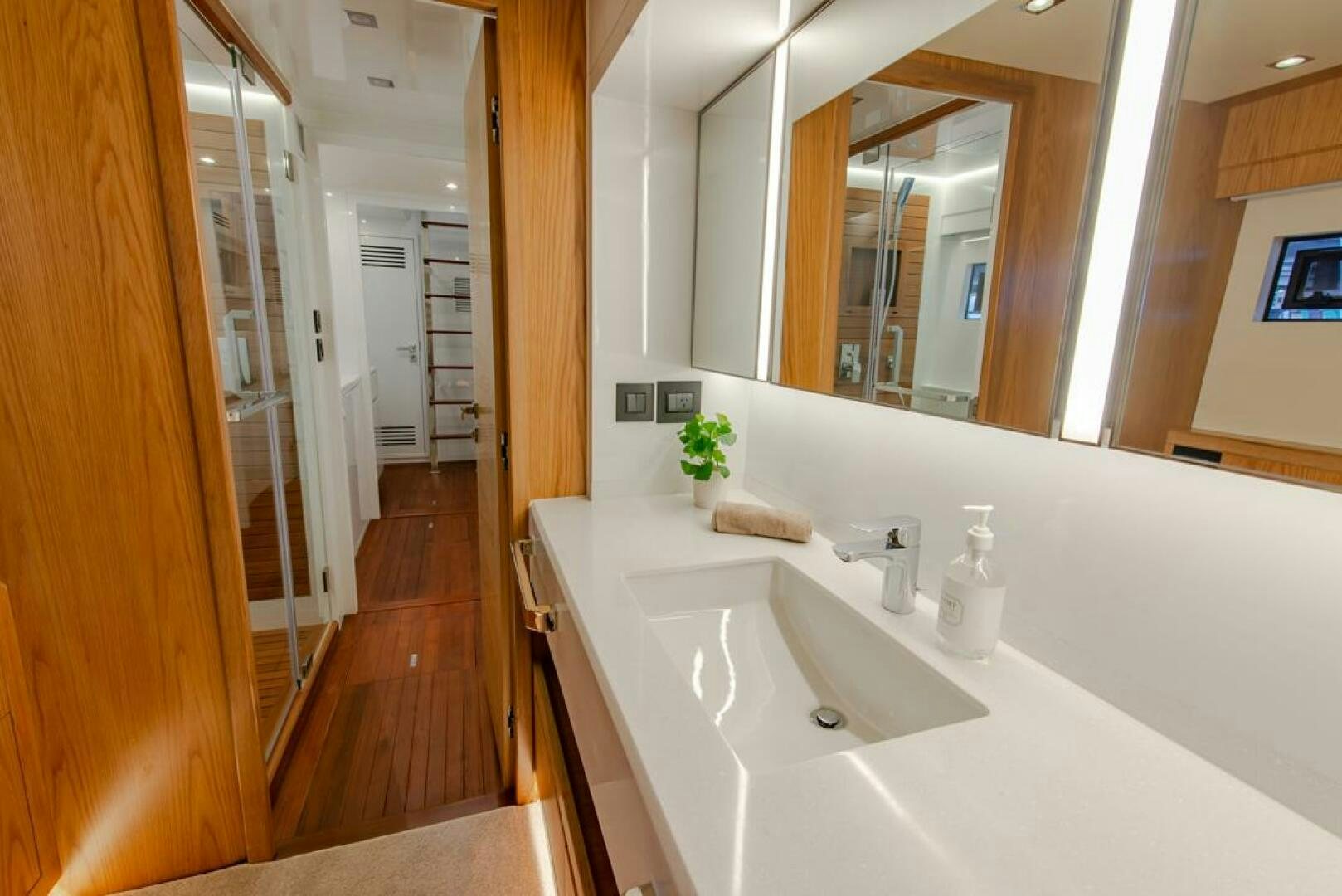 a bathroom with a sink and a mirror aboard NONE Yacht for Sale