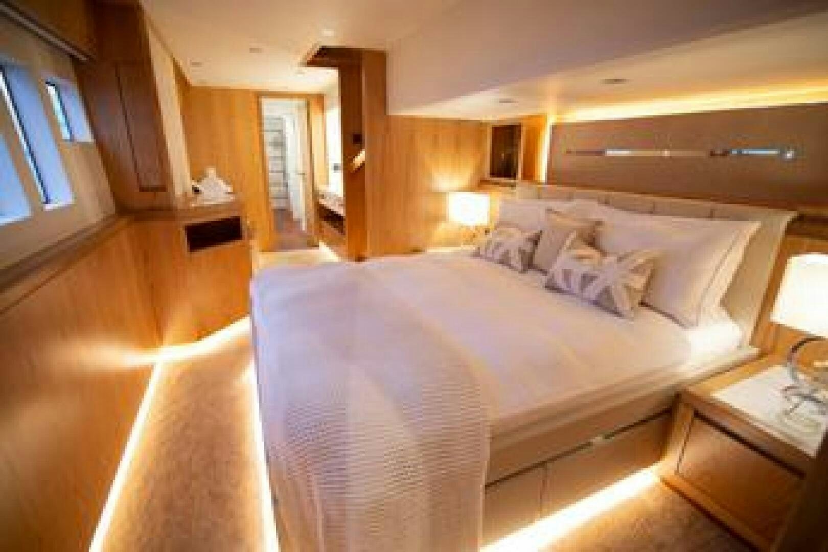 a large bed in a room aboard NONE Yacht for Sale