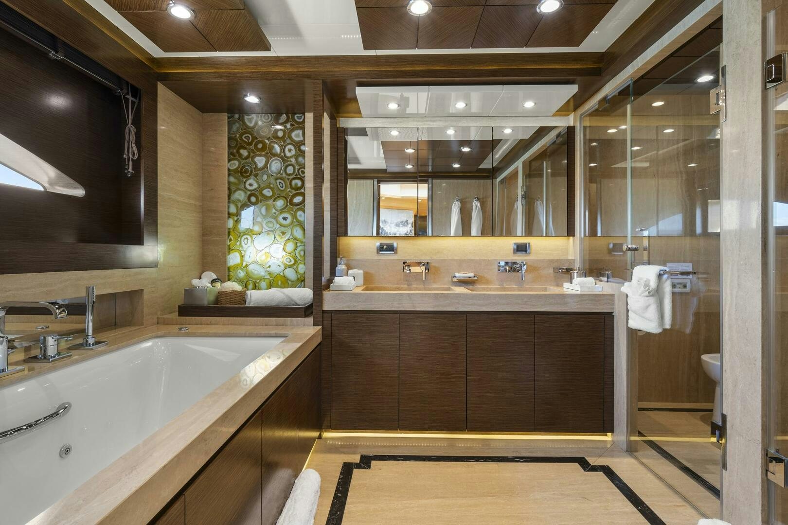 a bathroom with a large sink aboard SWEET CAROLINE Yacht for Sale