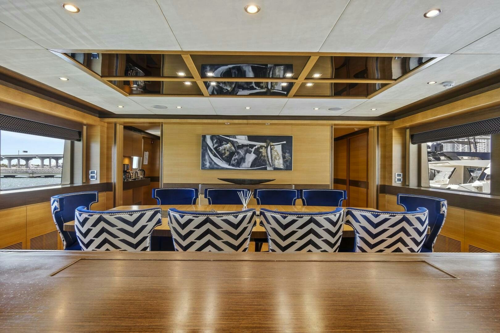 a conference room with chairs and a table aboard SWEET CAROLINE Yacht for Sale