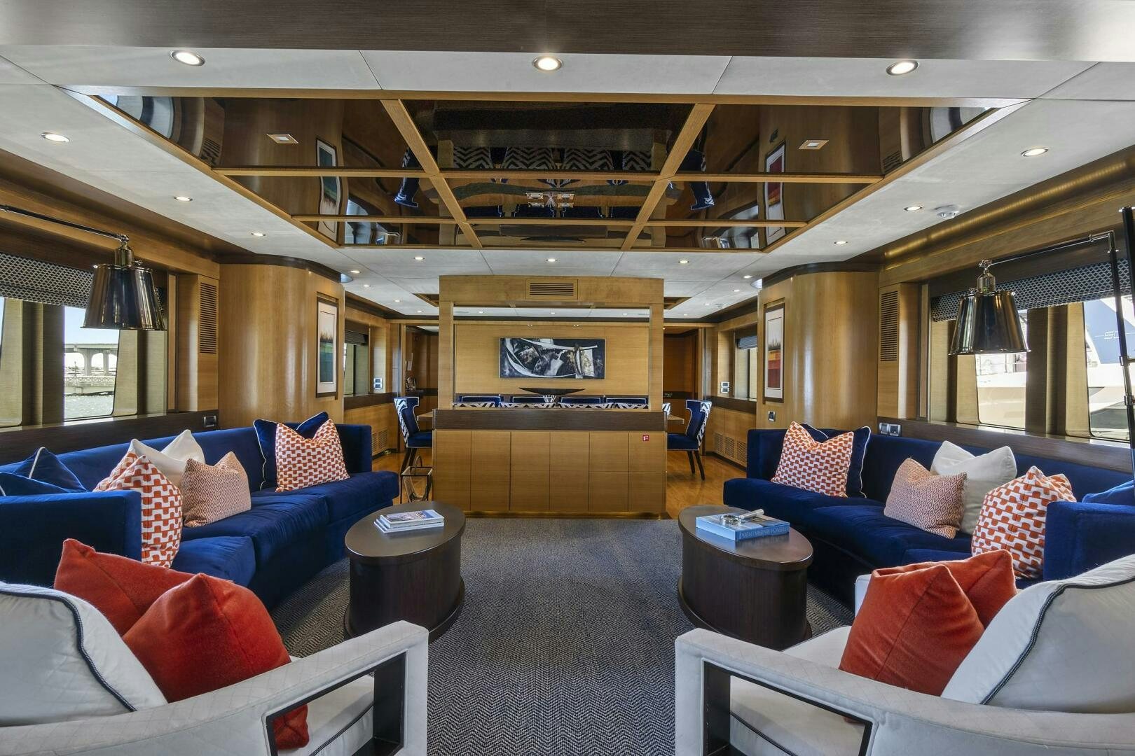 a room with a couch and a table aboard SWEET CAROLINE Yacht for Sale