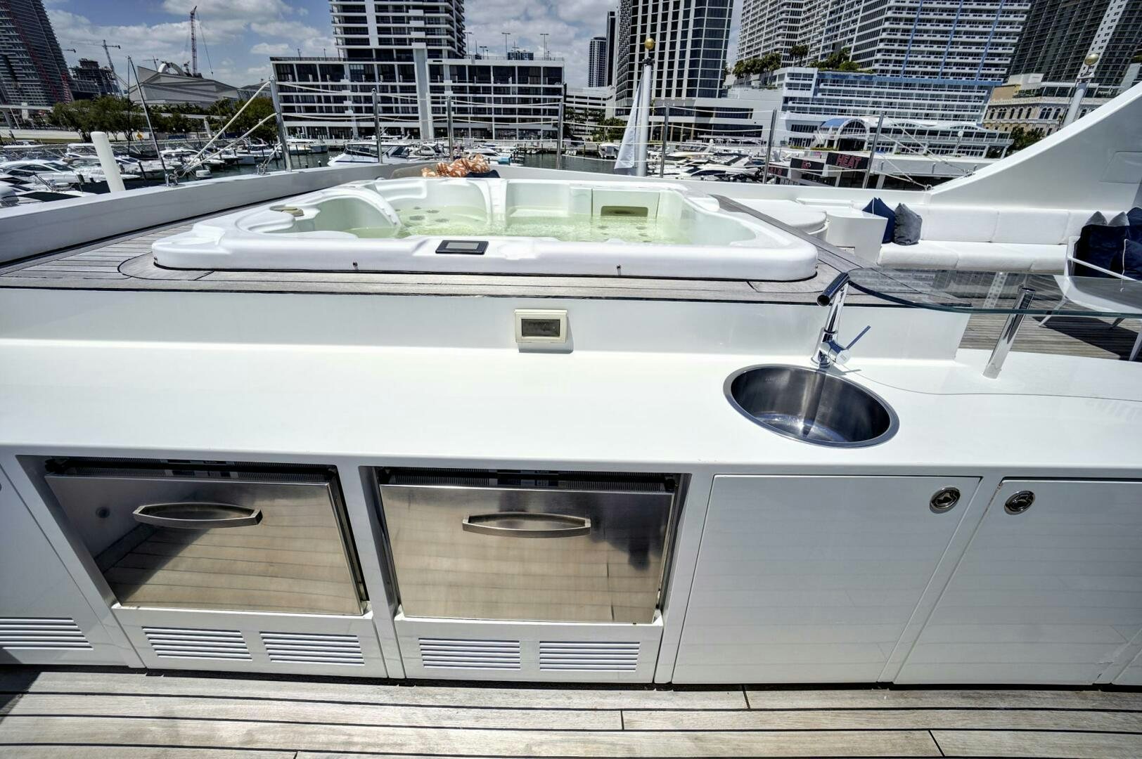 a white boat with a black roof aboard SWEET CAROLINE Yacht for Sale