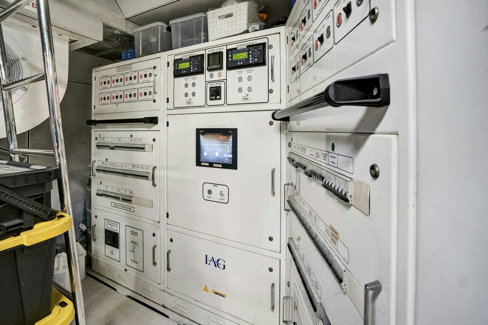 a room with white machines aboard SWEET CAROLINE Yacht for Sale