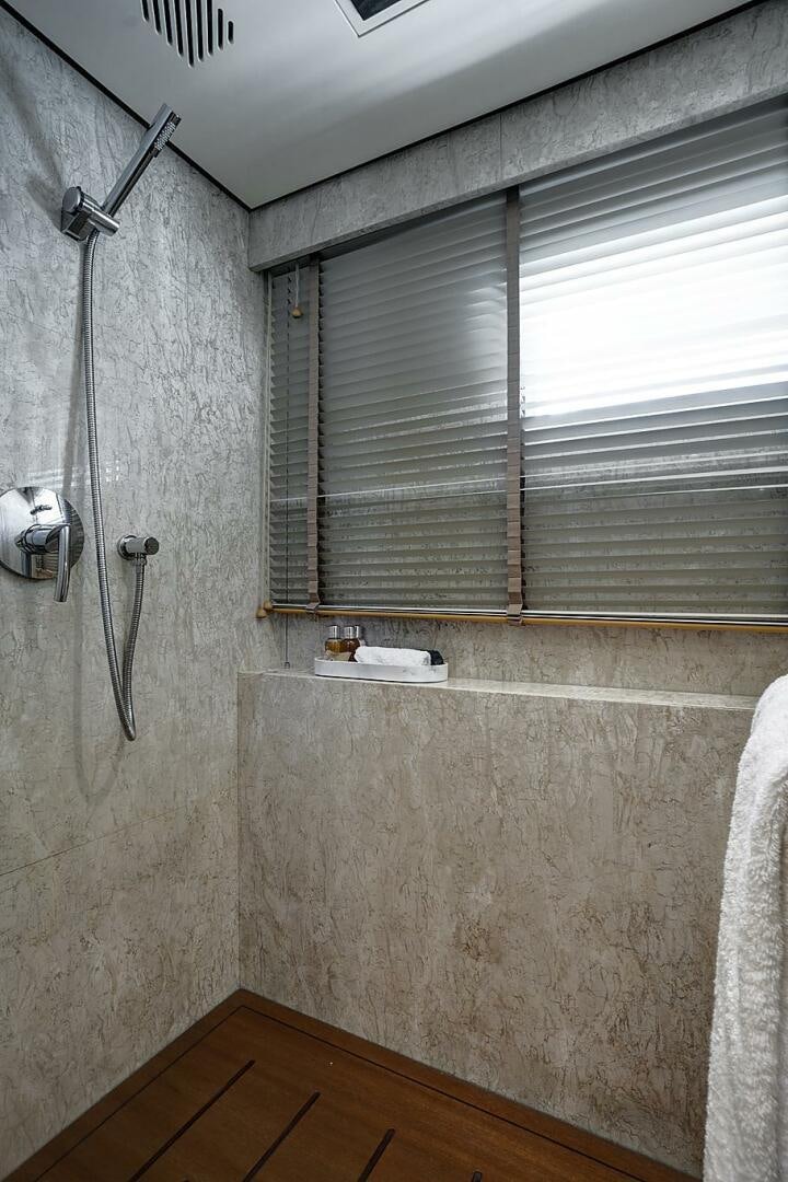 a shower with a window aboard SWEET CAROLINE Yacht for Sale