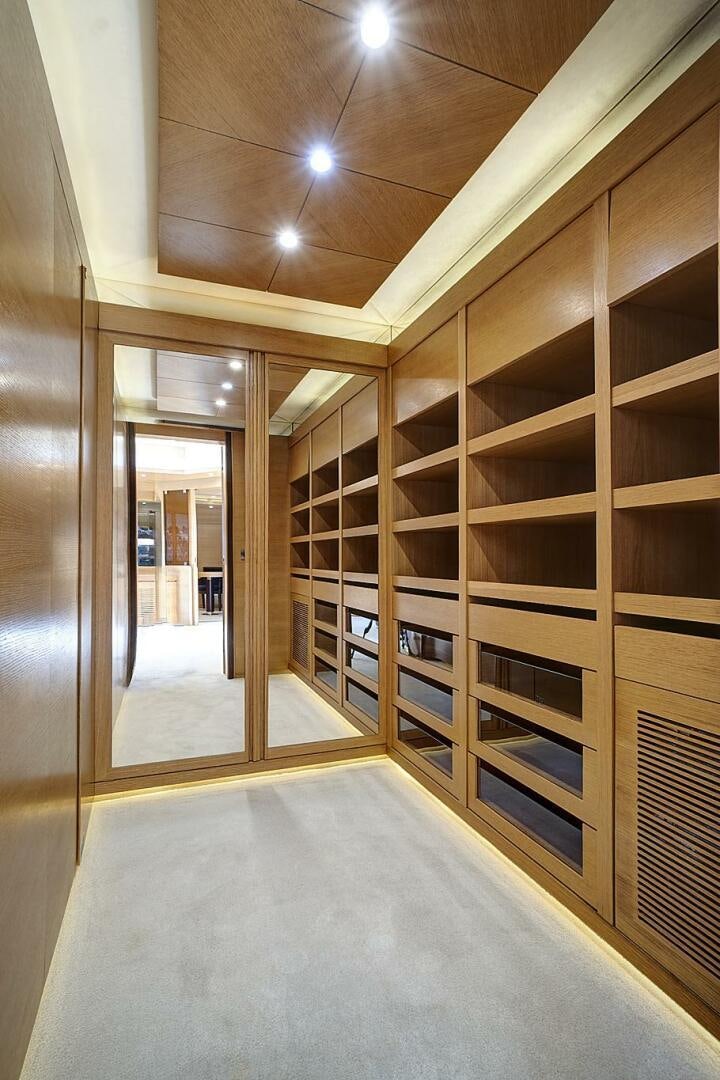 a room with a large glass door aboard SWEET CAROLINE Yacht for Sale