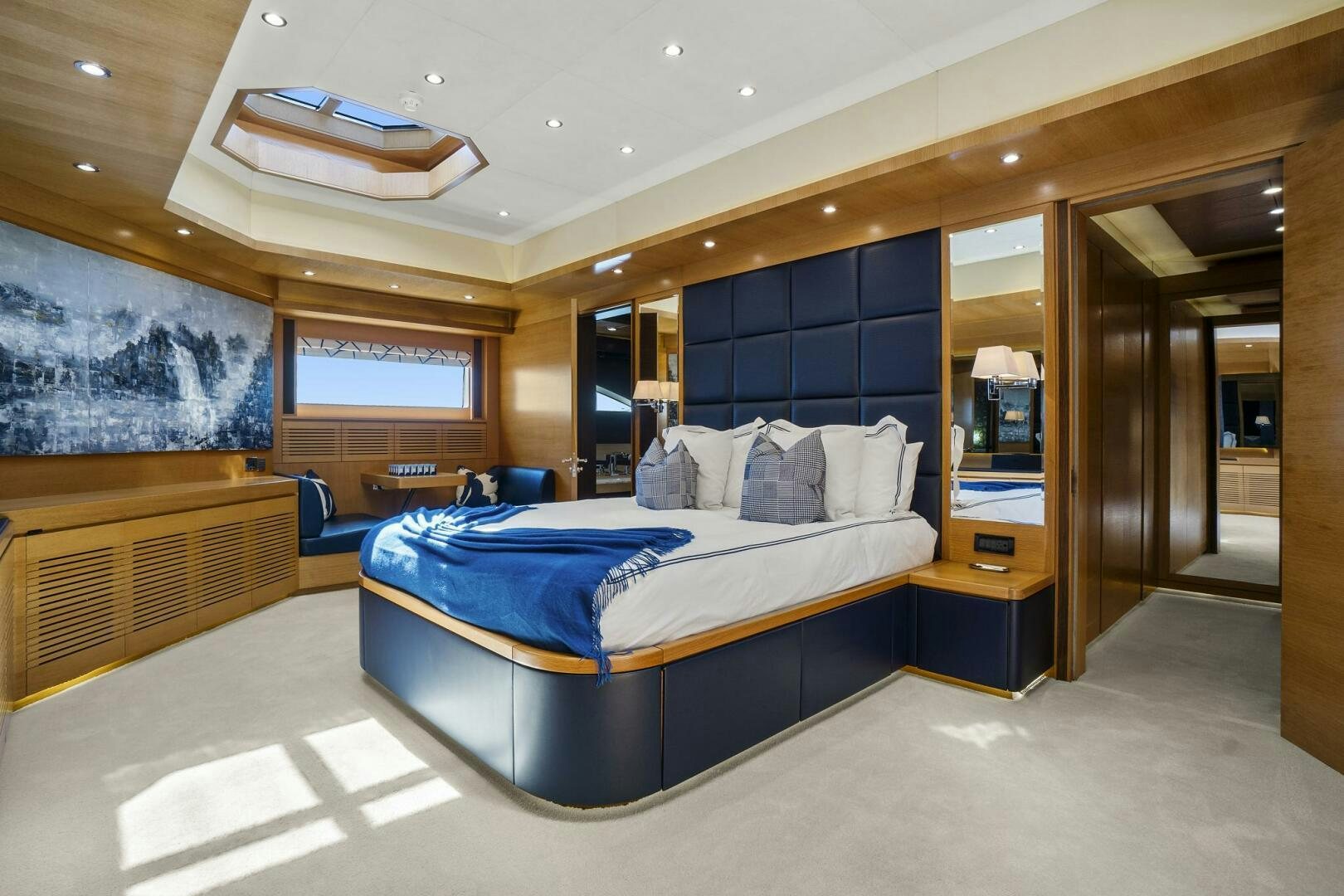 a large bedroom with a large bed aboard SWEET CAROLINE Yacht for Sale