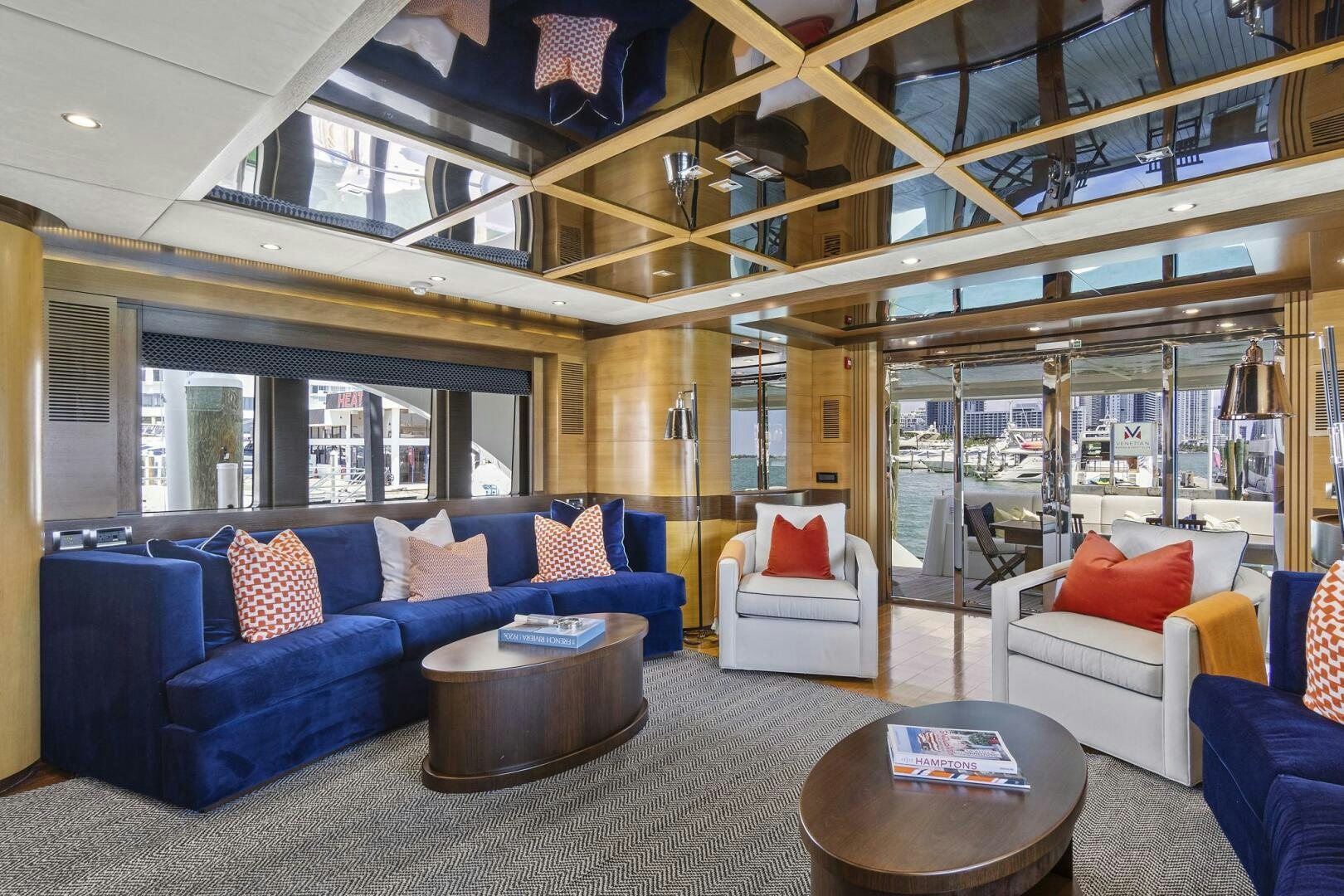 a living room with a large glass ceiling aboard SWEET CAROLINE Yacht for Sale