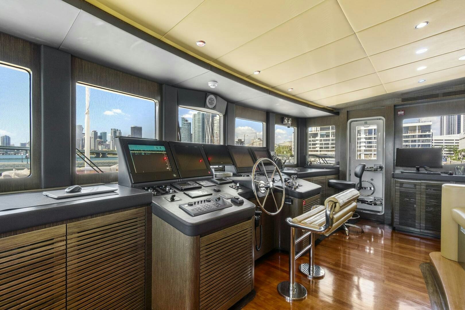 a room with computers and monitors aboard SWEET CAROLINE Yacht for Sale