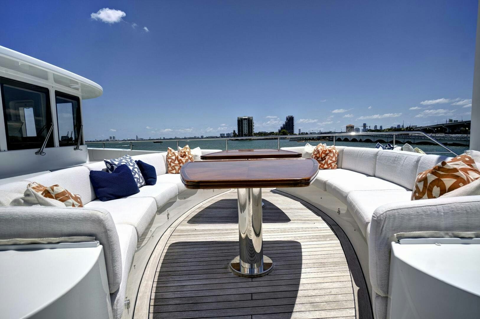 a room with a table and chairs aboard SWEET CAROLINE Yacht for Sale