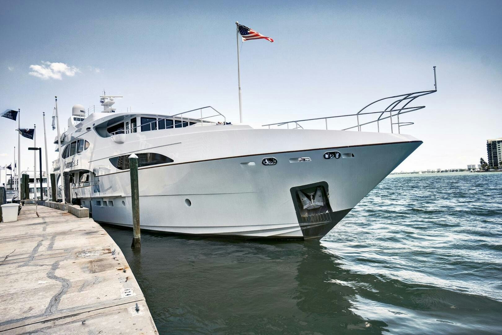 a large white boat on the water aboard SWEET CAROLINE Yacht for Sale