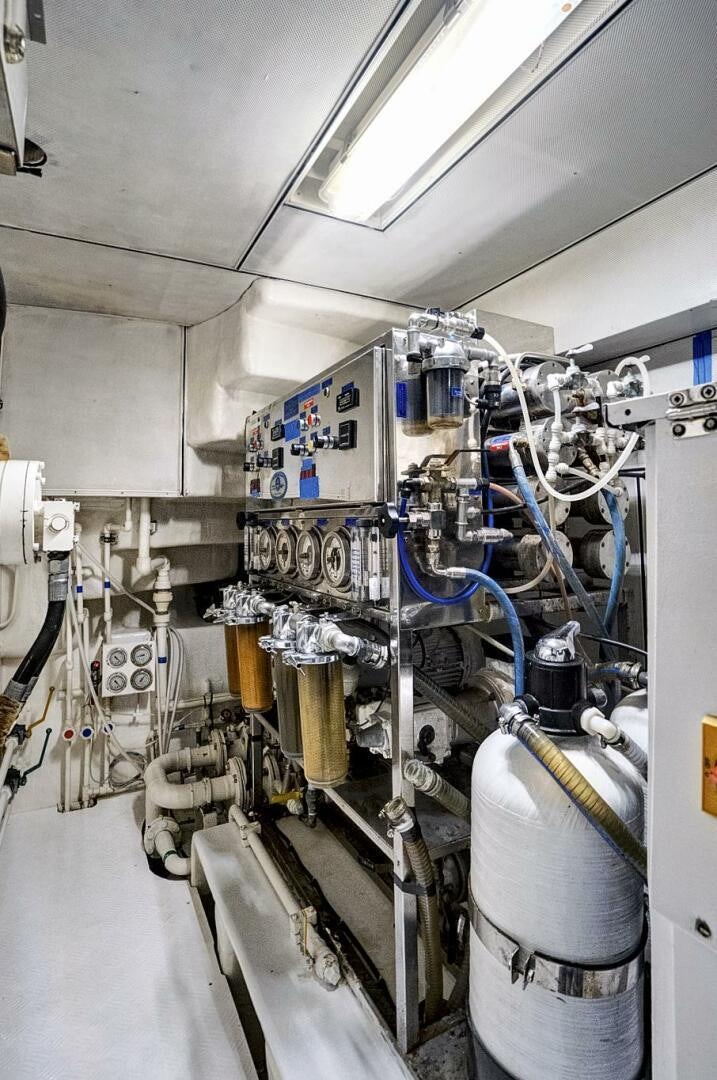 a room with pipes and tubes aboard SWEET CAROLINE Yacht for Sale