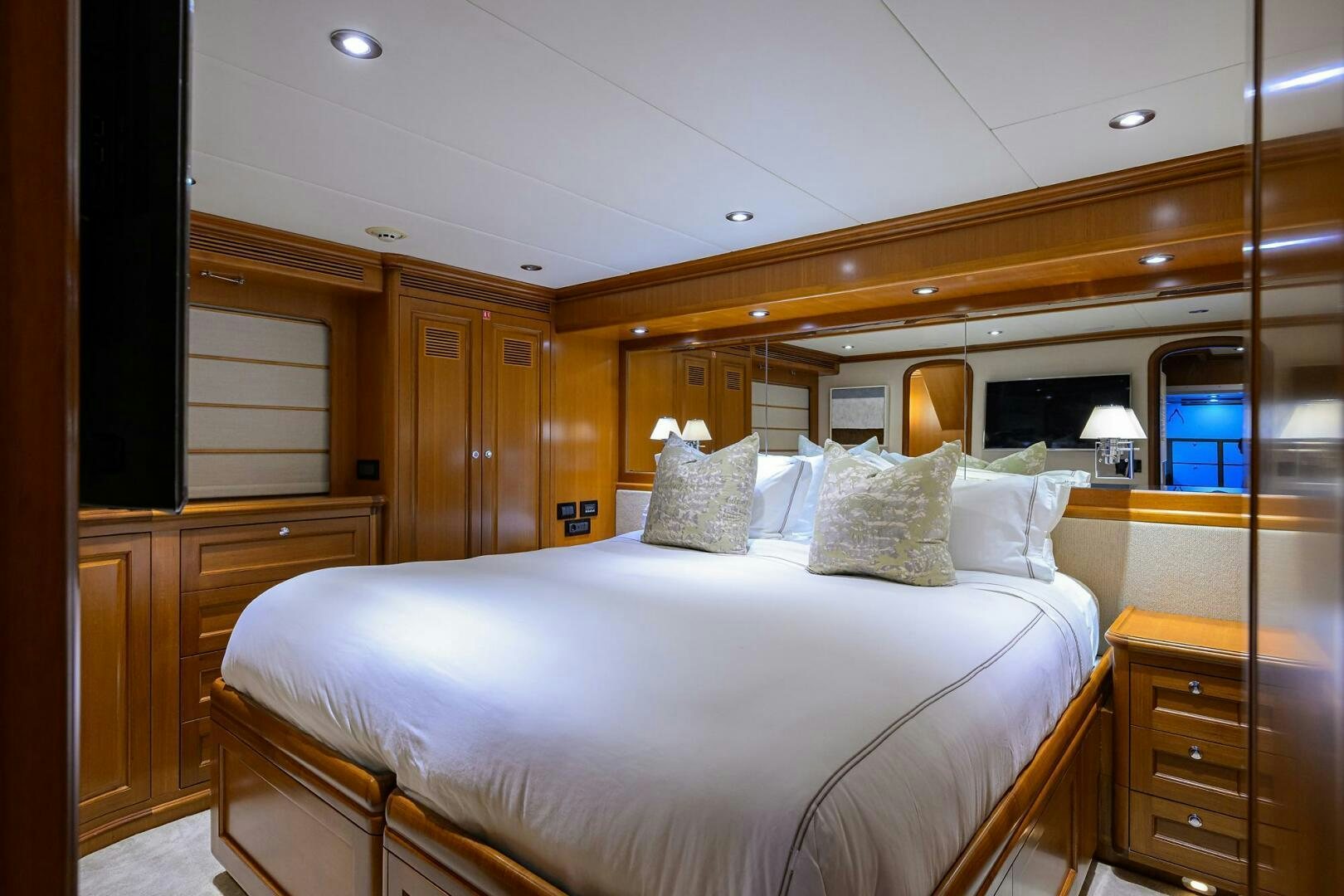 a large bed in a room aboard SOLACE Yacht for Sale