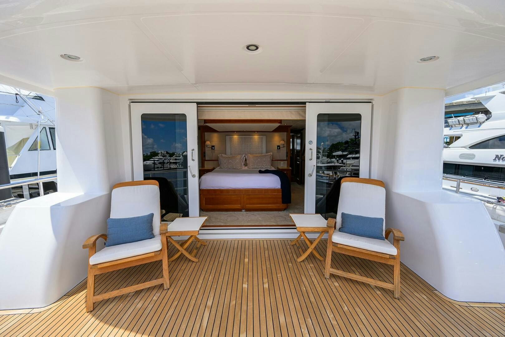 a living room with a wood floor aboard SOLACE Yacht for Sale
