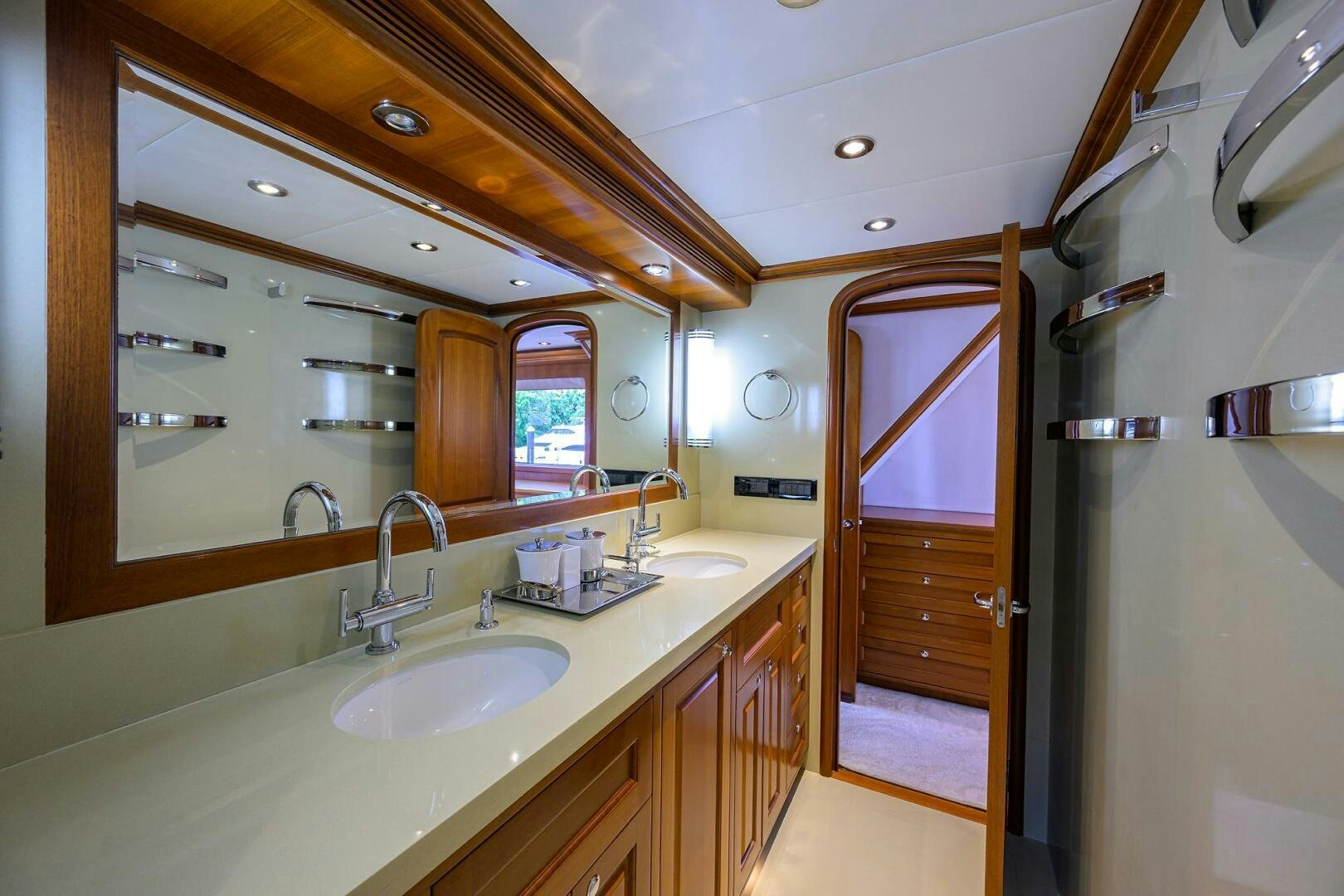 a bathroom with a sink and a mirror aboard SOLACE Yacht for Sale