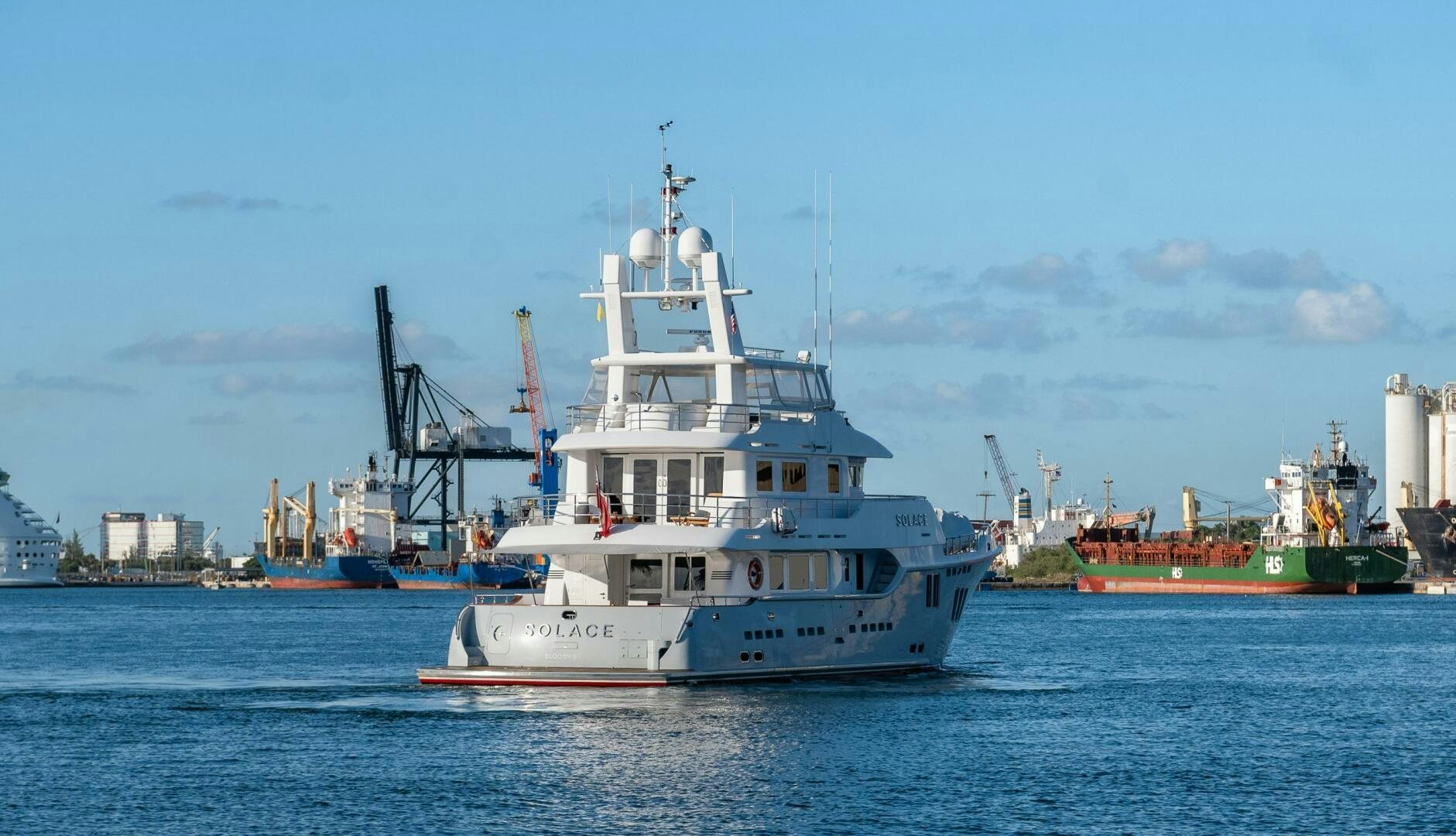 a large white boat in the water aboard SOLACE Yacht for Sale