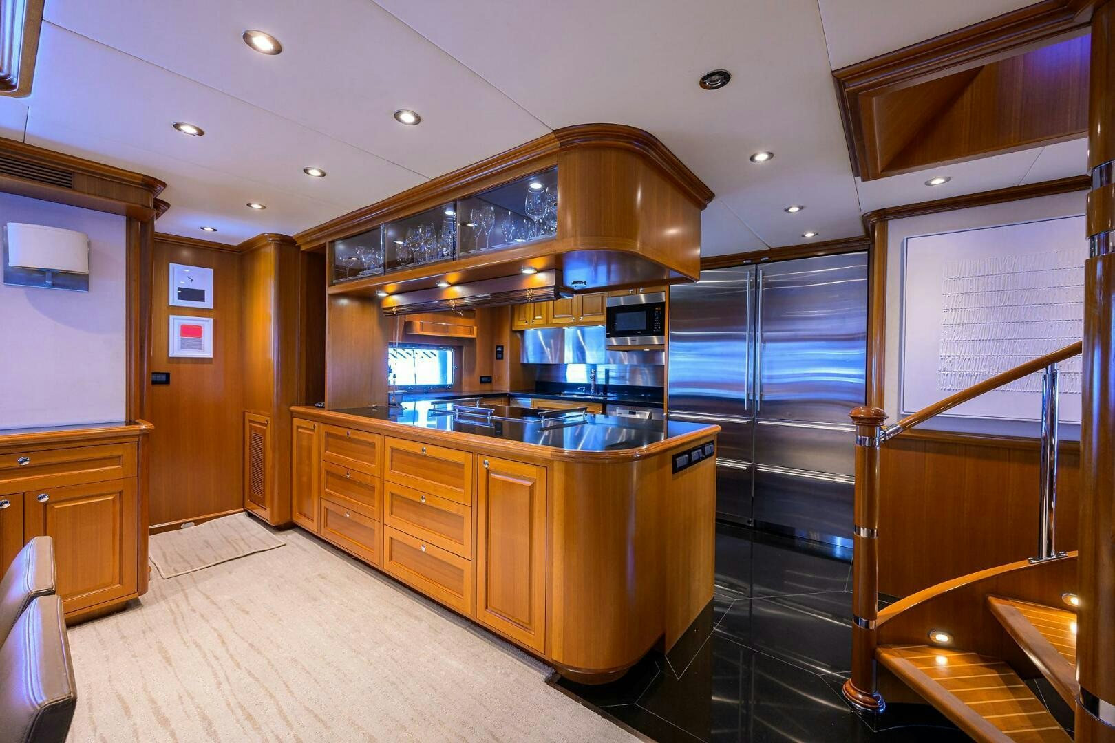 a kitchen with a large glass shower aboard SOLACE Yacht for Sale