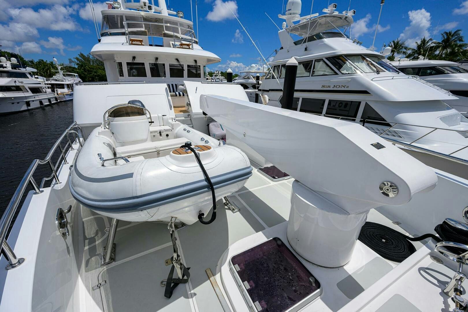 a boat docked at a pier aboard SOLACE Yacht for Sale