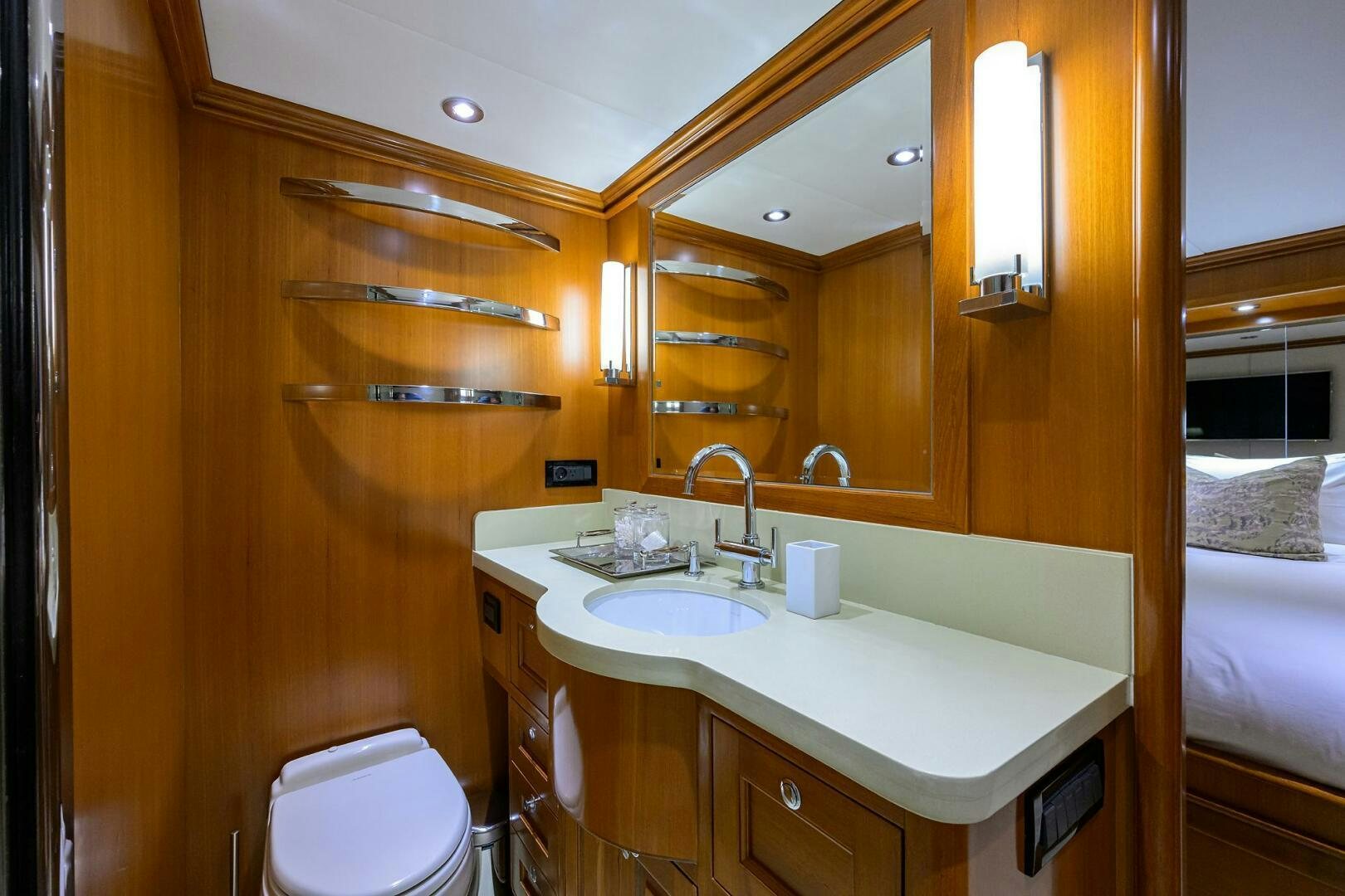 a bathroom with a sink and a mirror aboard SOLACE Yacht for Sale