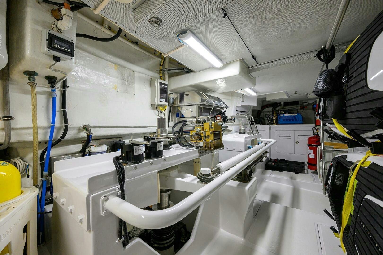 a room with machinery aboard SOLACE Yacht for Sale
