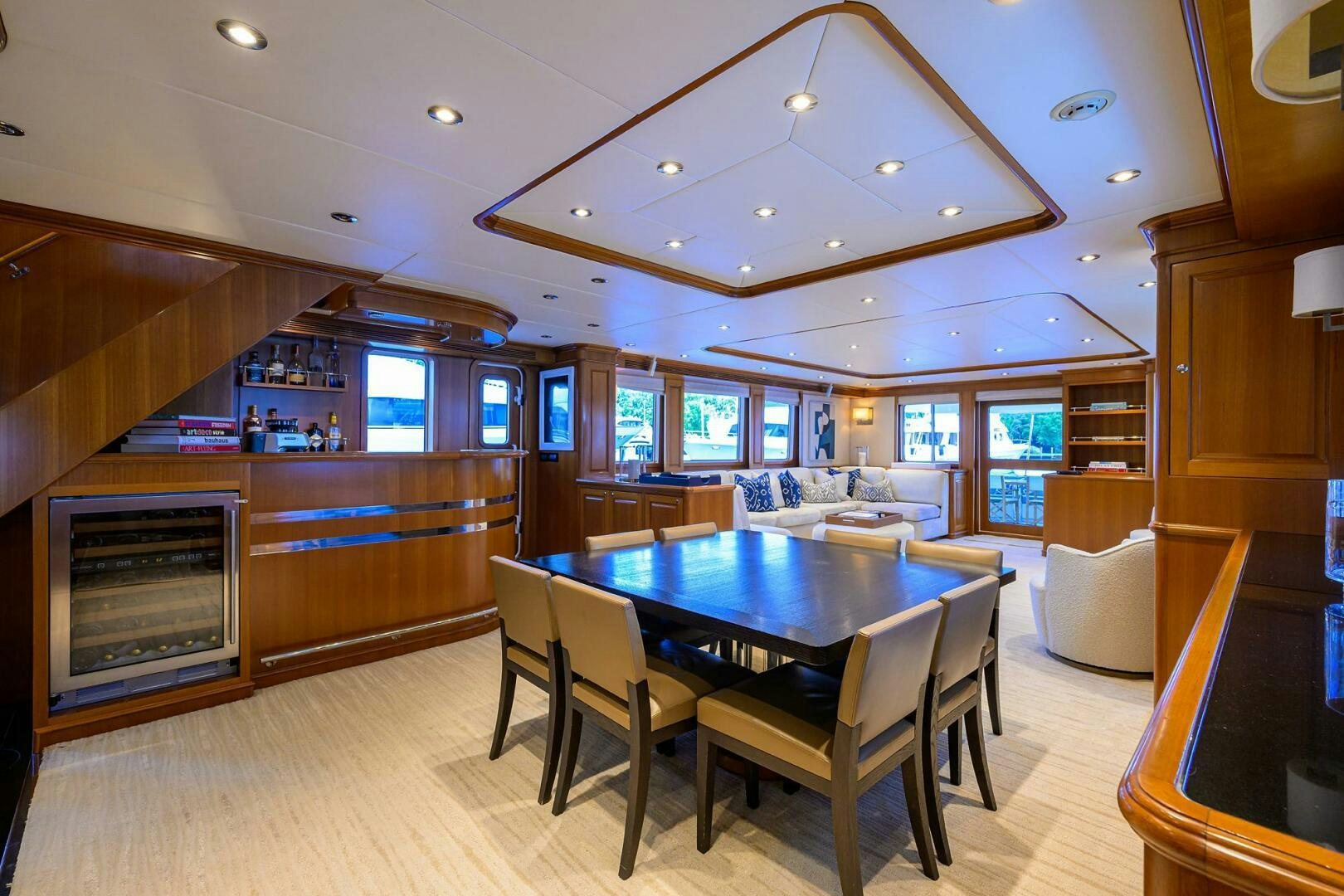 a large kitchen with a dining table aboard SOLACE Yacht for Sale
