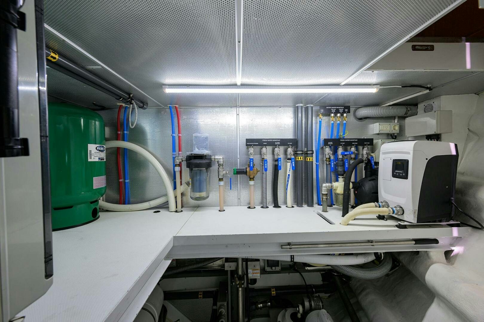 a room with several machines aboard SOLACE Yacht for Sale