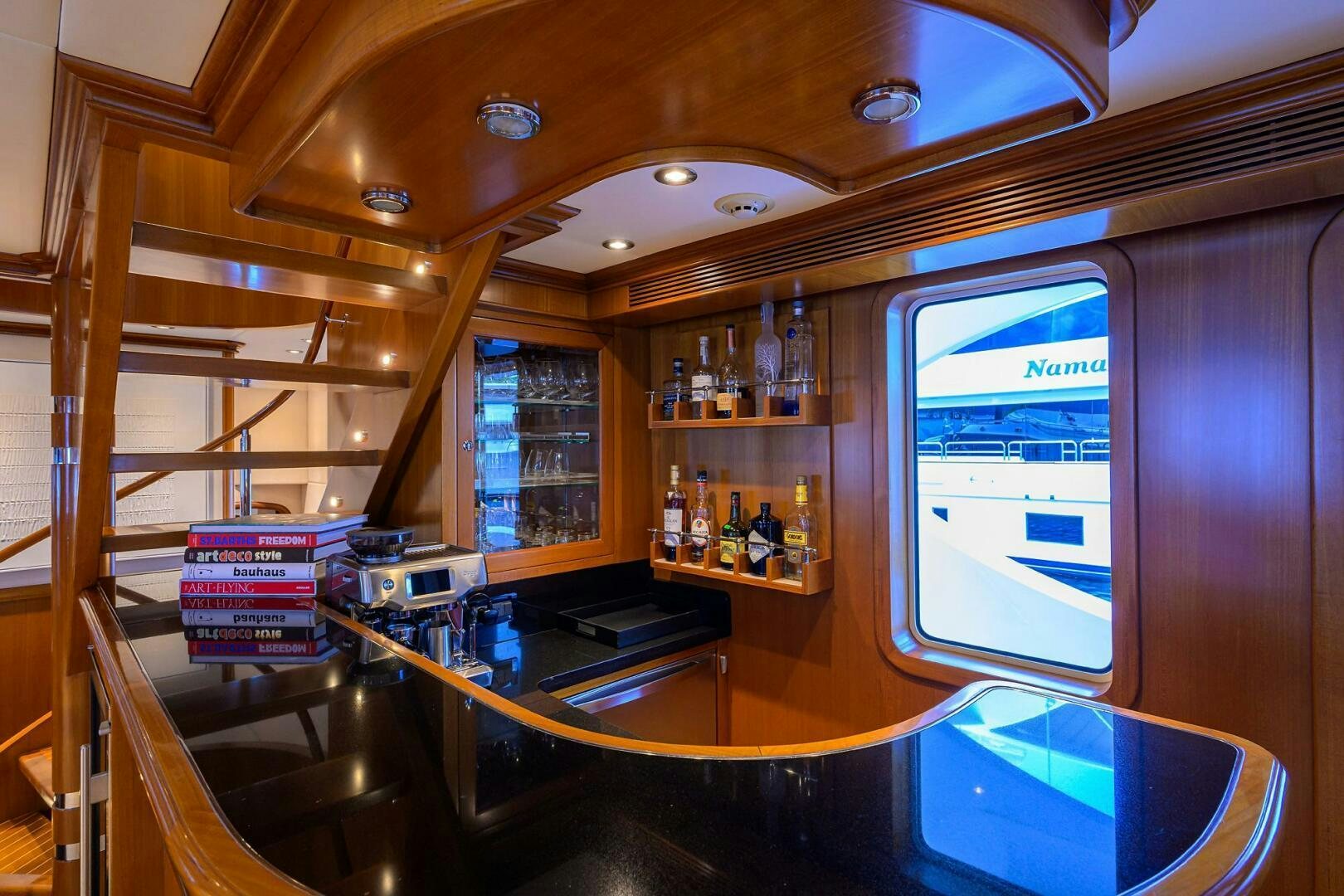 a bar with a bar and bar aboard SOLACE Yacht for Sale