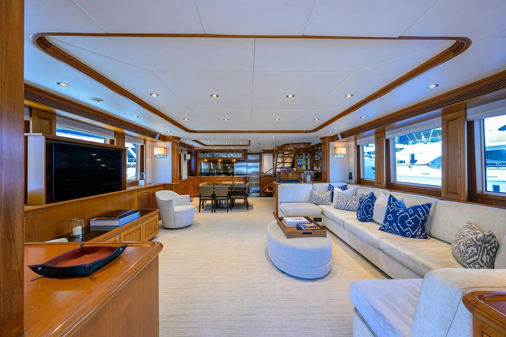 a living room with a large window aboard SOLACE Yacht for Sale