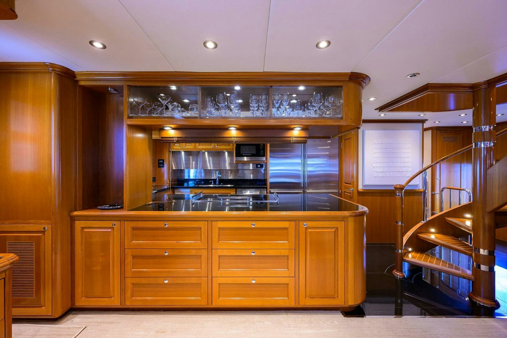a kitchen with a large glass window aboard SOLACE Yacht for Sale