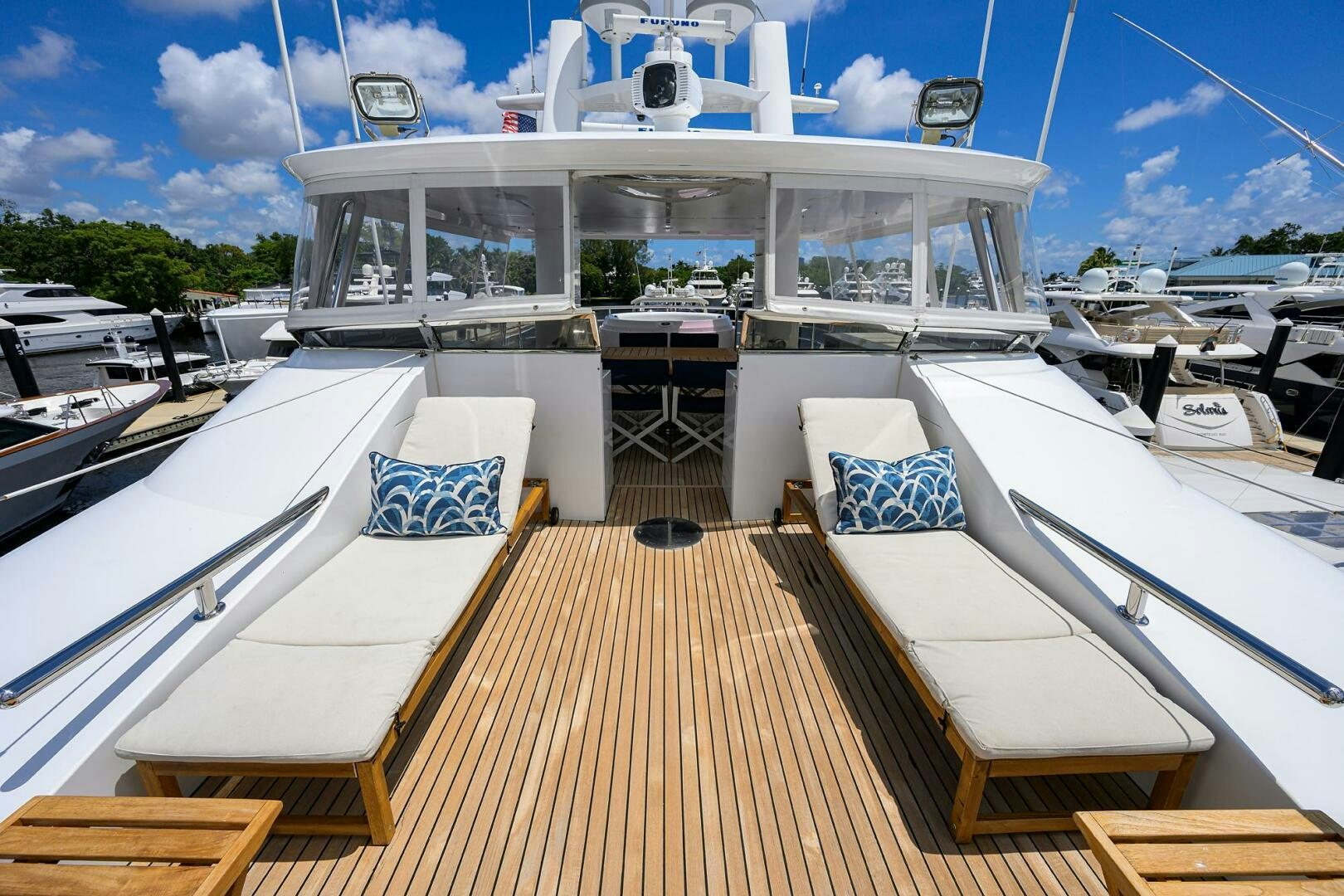 a deck with a boat on it aboard SOLACE Yacht for Sale