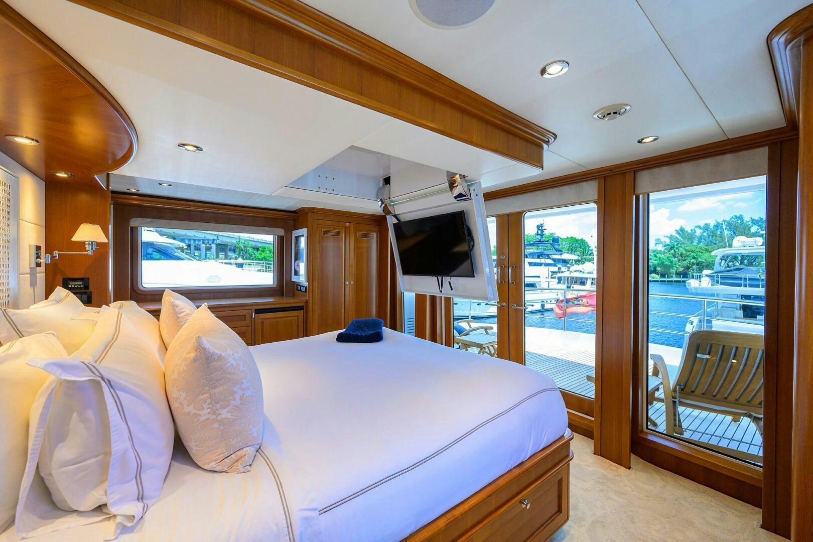 a bed in a room aboard SOLACE Yacht for Sale